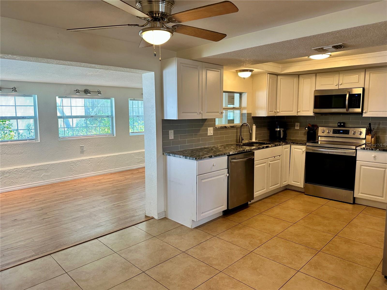 Kitchen to bonus family room-towards back of home