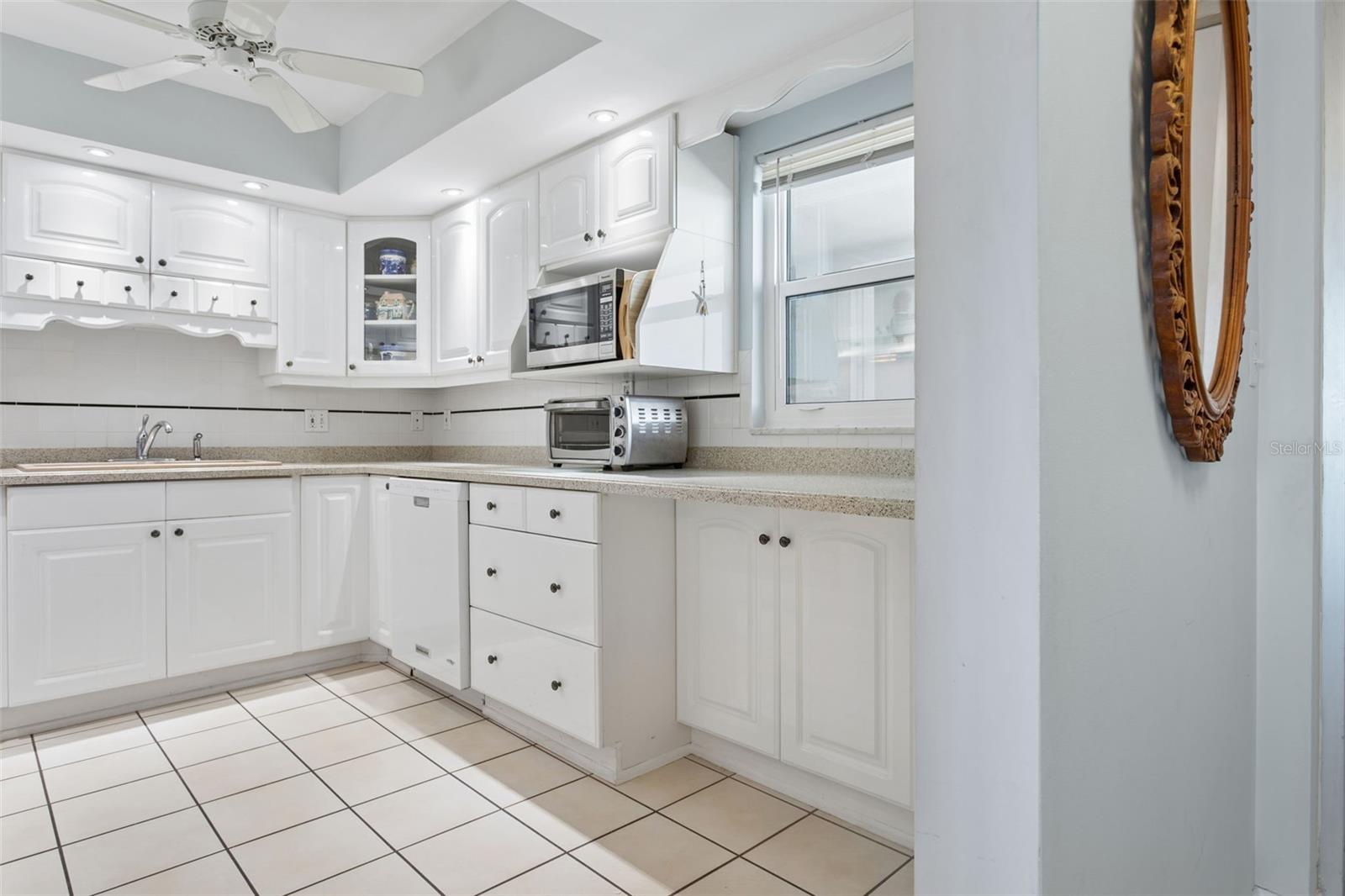 Semi updated kitchen w/CT flooring