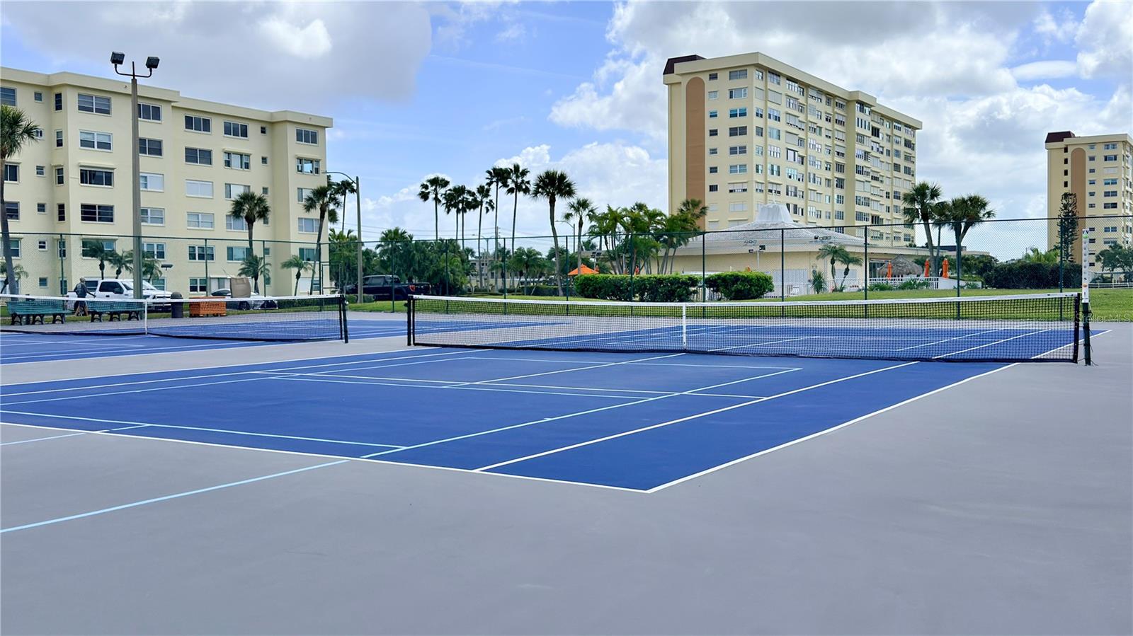 Community Tennis & Pickleball Courts – The community's well-maintained courts offer freshly resurfaced playing surfaces surrounded by lush palm trees — perfect for staying active and social right within your own neighborhood.