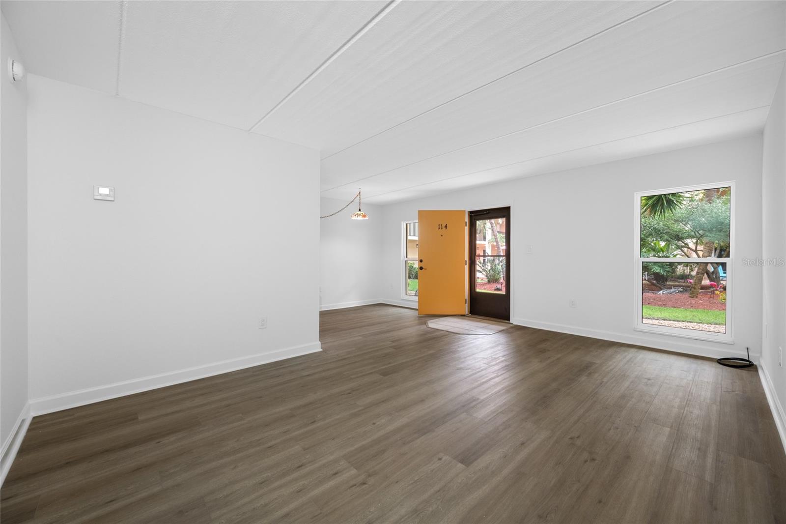 Living room with dining area in top bu front door