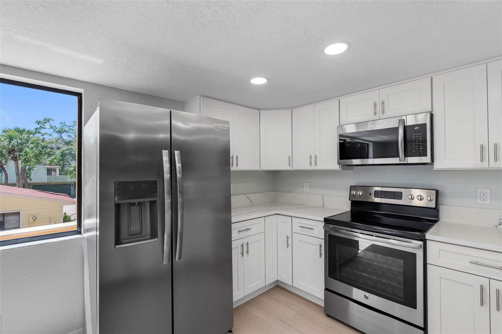 All new stainless steel appliances.