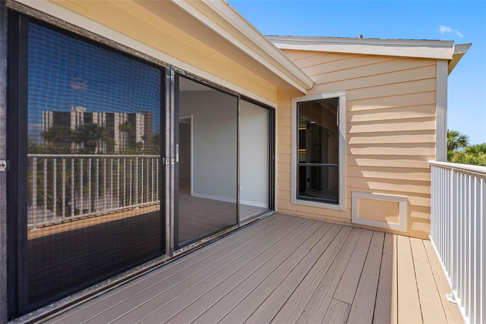 Primary suite has a large balcony.