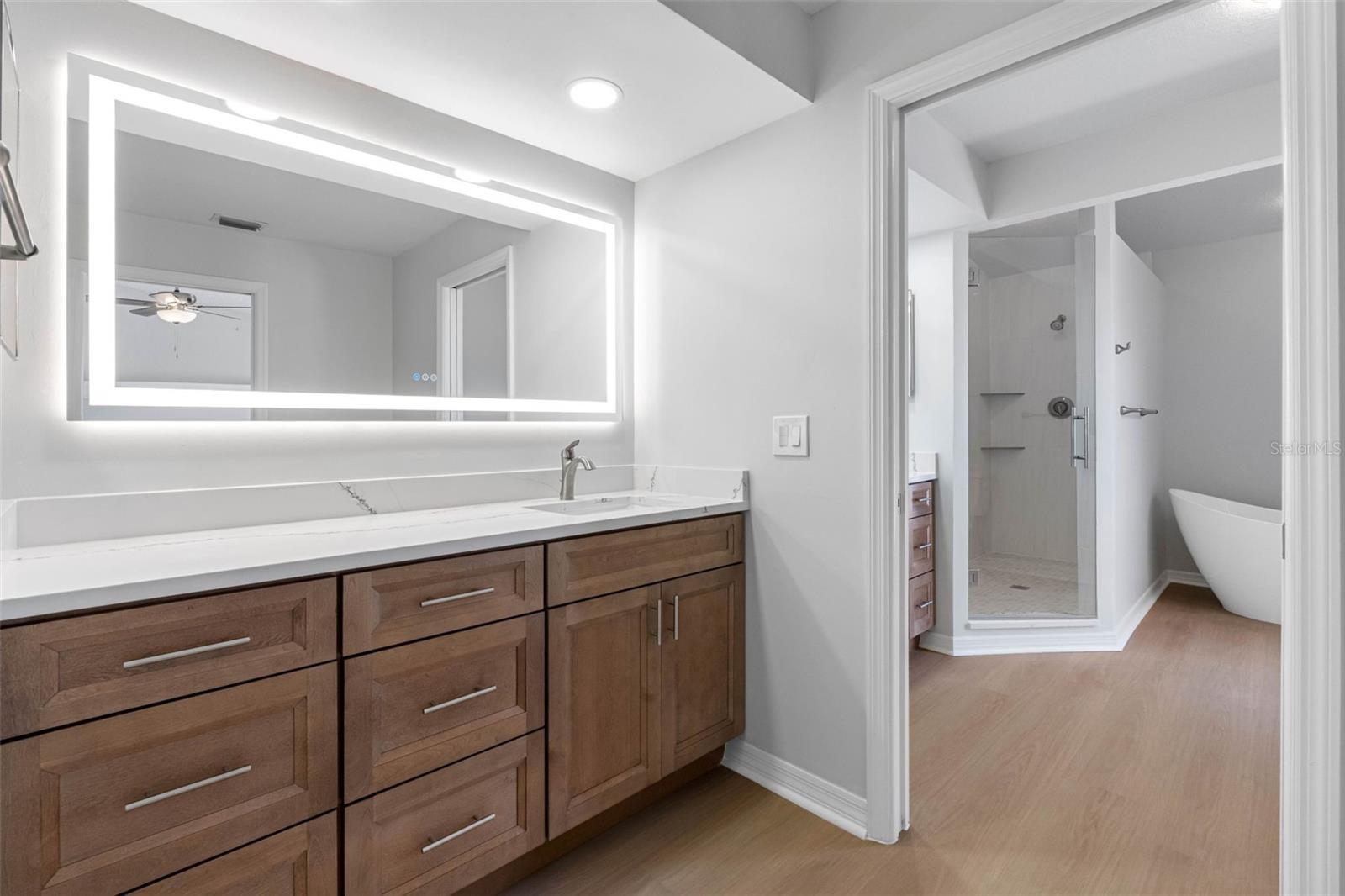 Ensuite bathroom with two separate vanities.