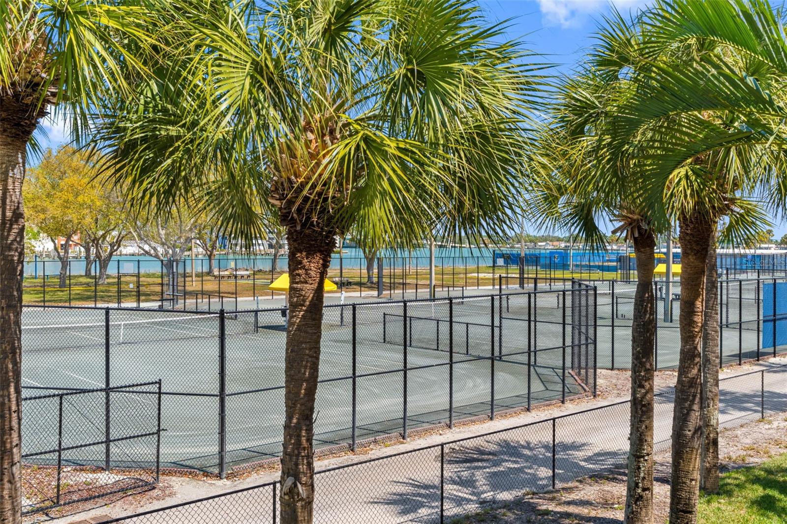 Overlooks tennis courts.