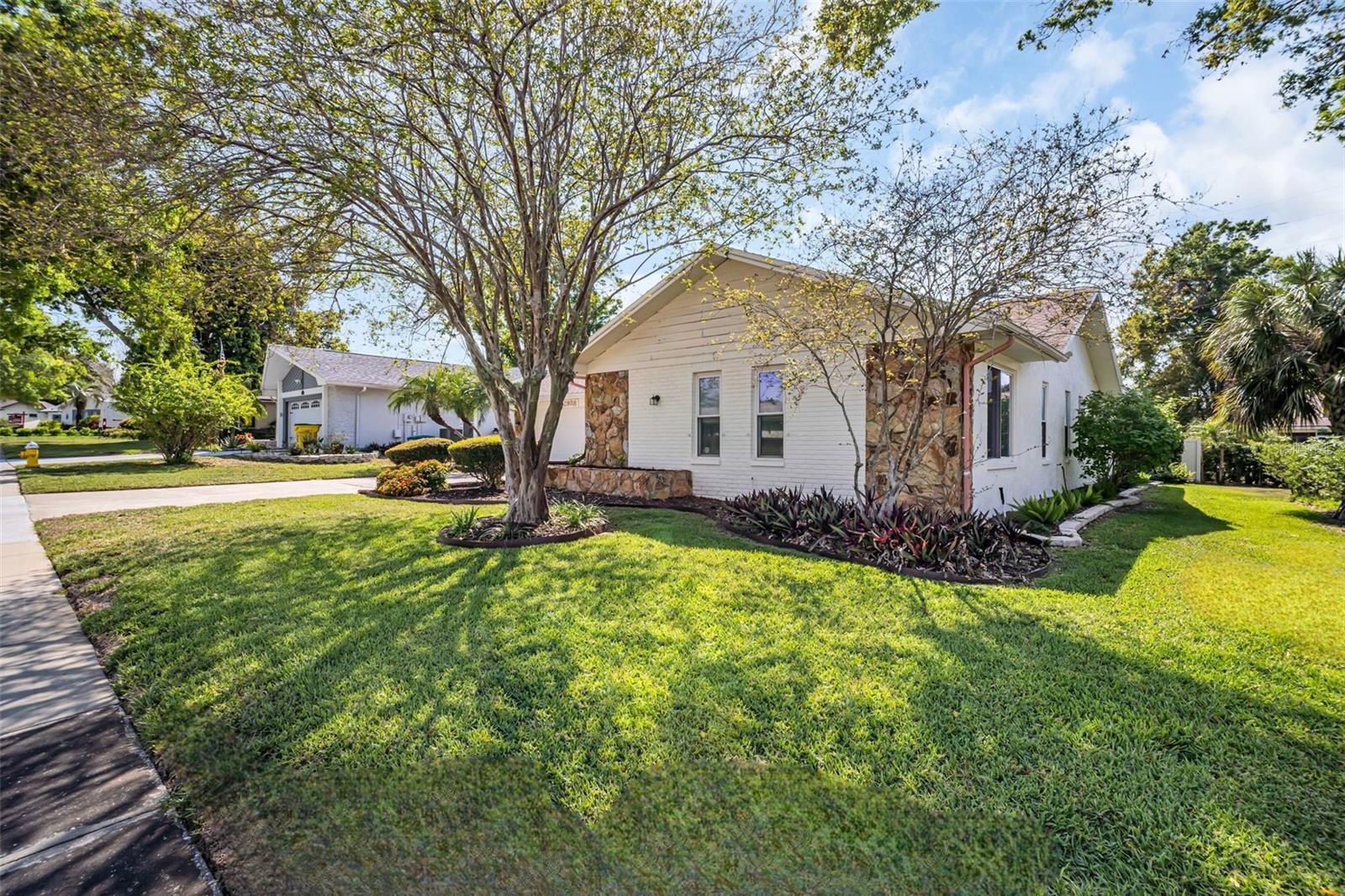 Updated windows, fresh new landscaping, and NEW roof (2024)~