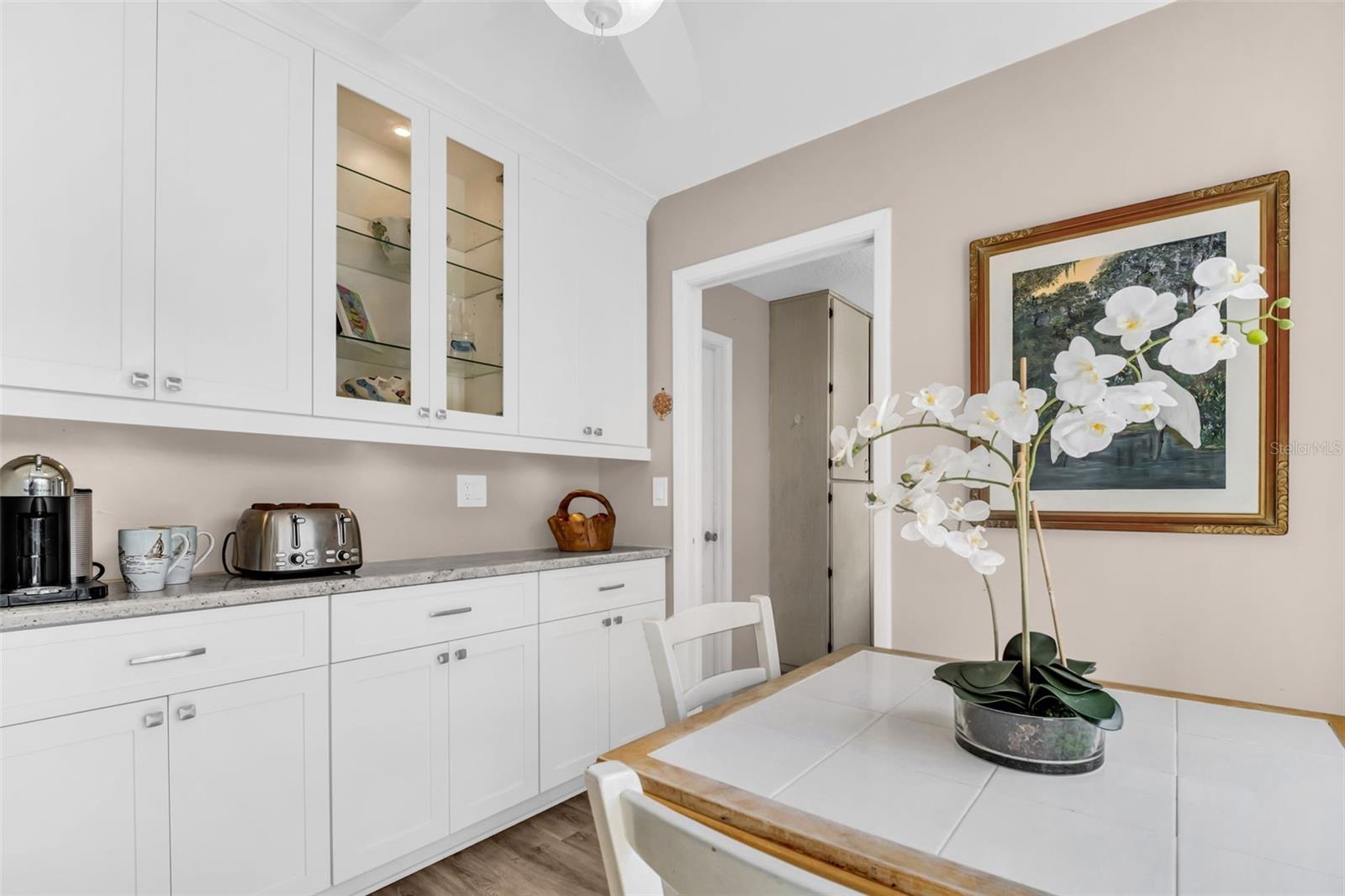 Additional custom cabinetry and the perfect coffee bar space~