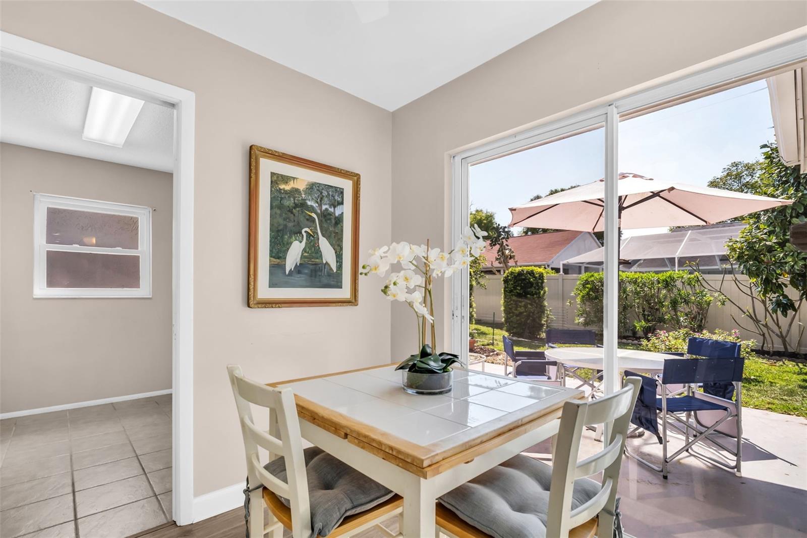 Opens to the large indoor laundry room with convenient garage access~