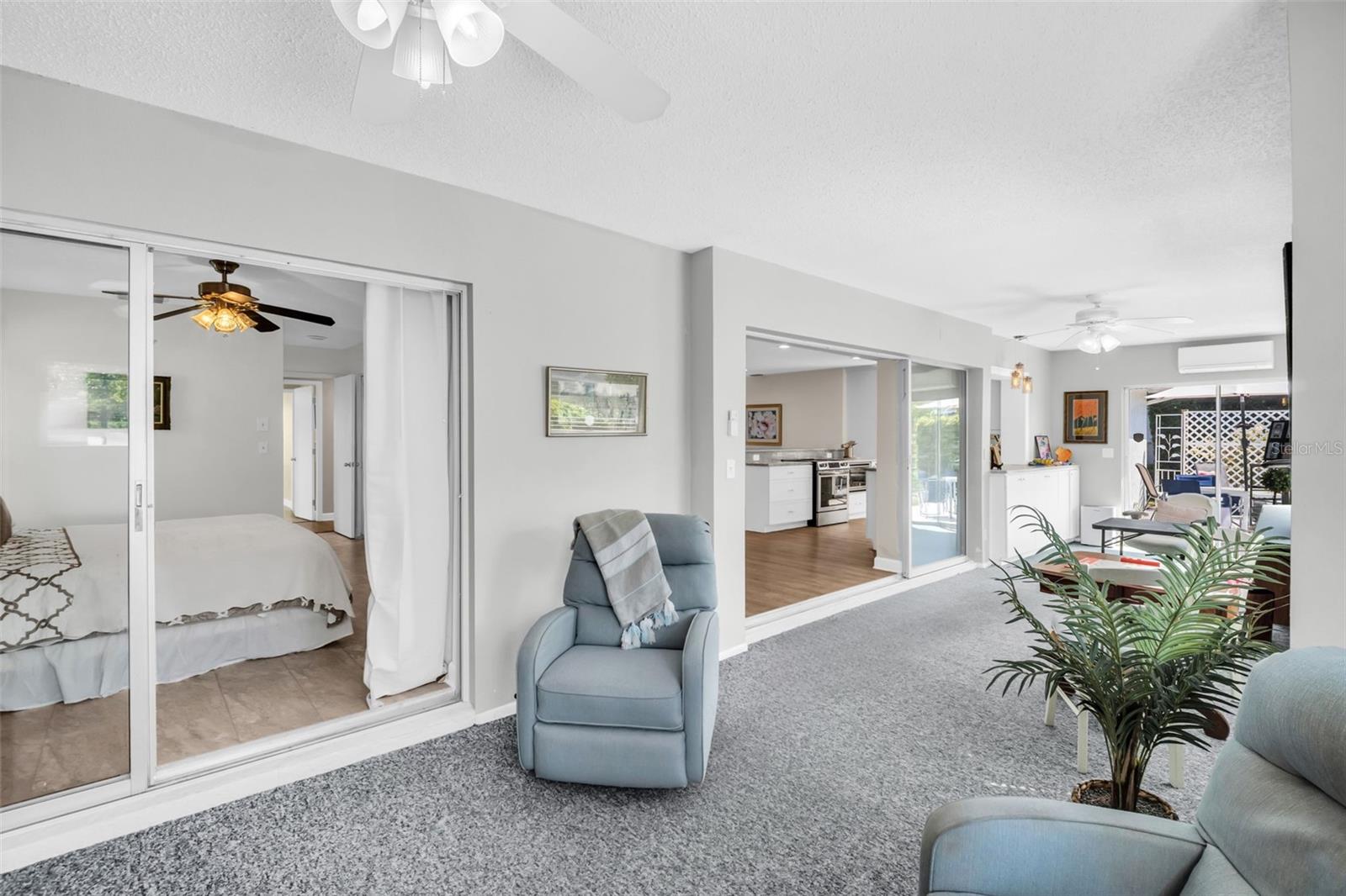 Glass sliders to the primary suite~