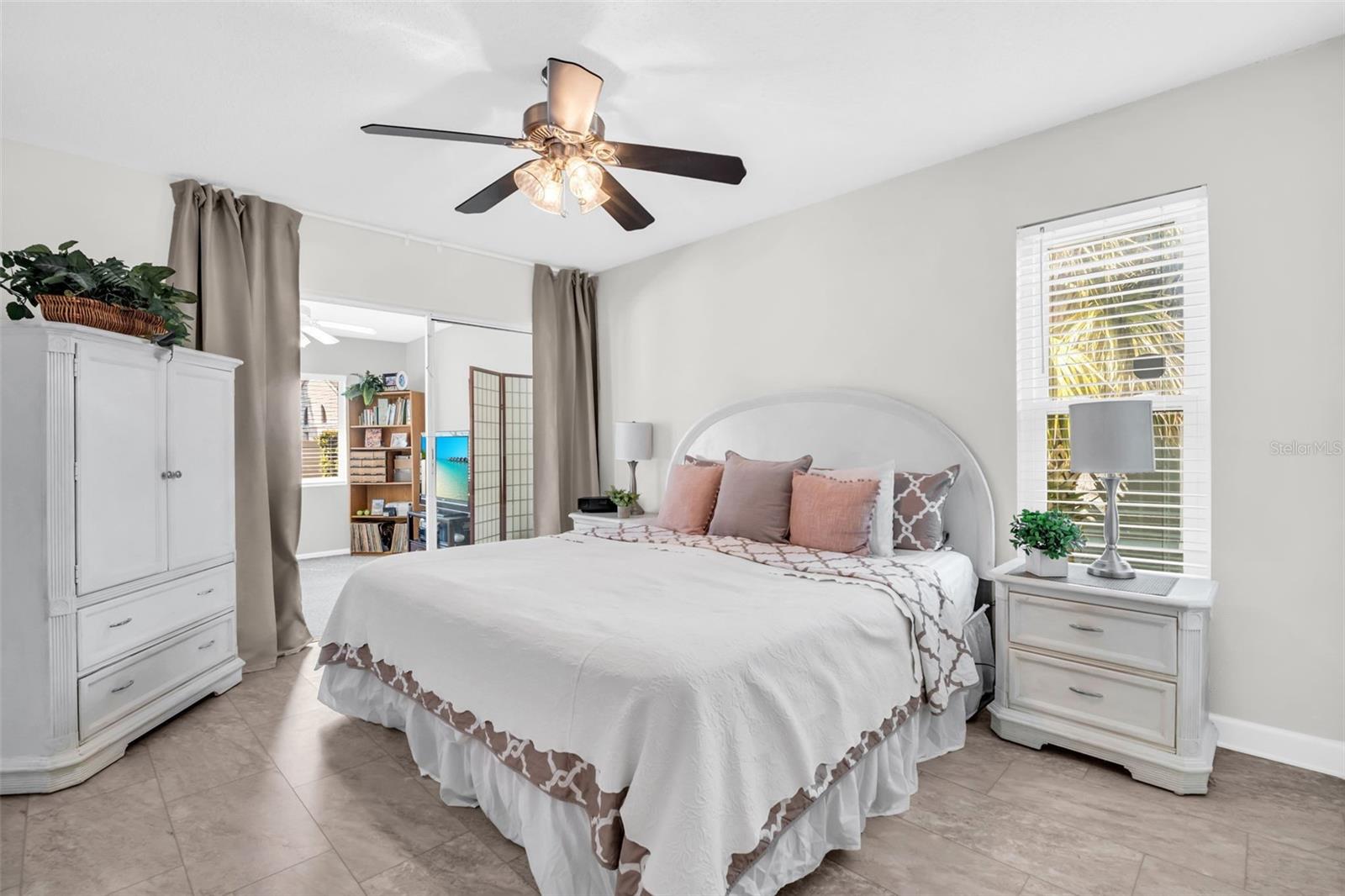 Primary oasis big enough for a king and privately tucked at the rear of the home~