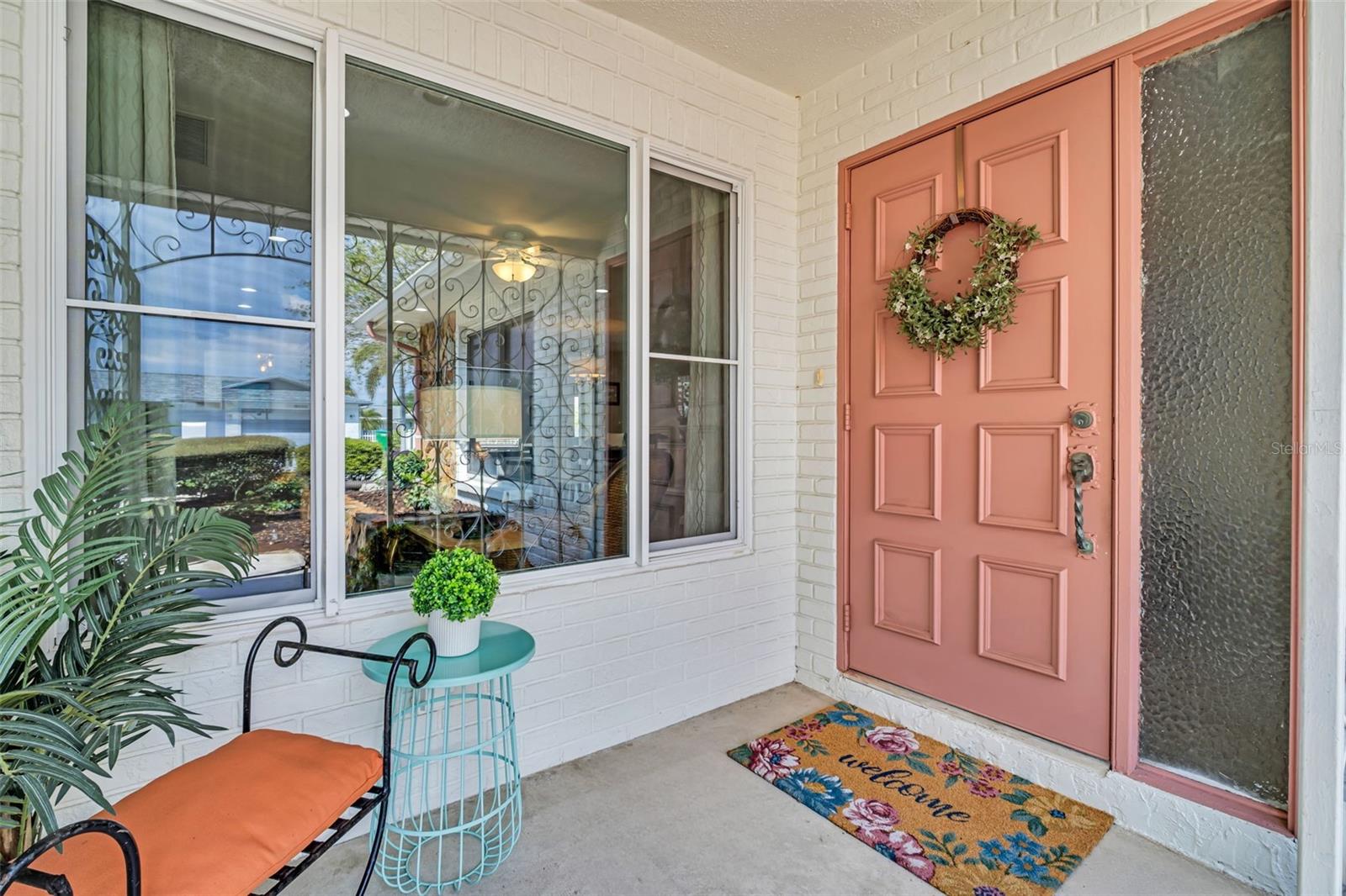 Beautiful updated impact window and freshly painted front door~