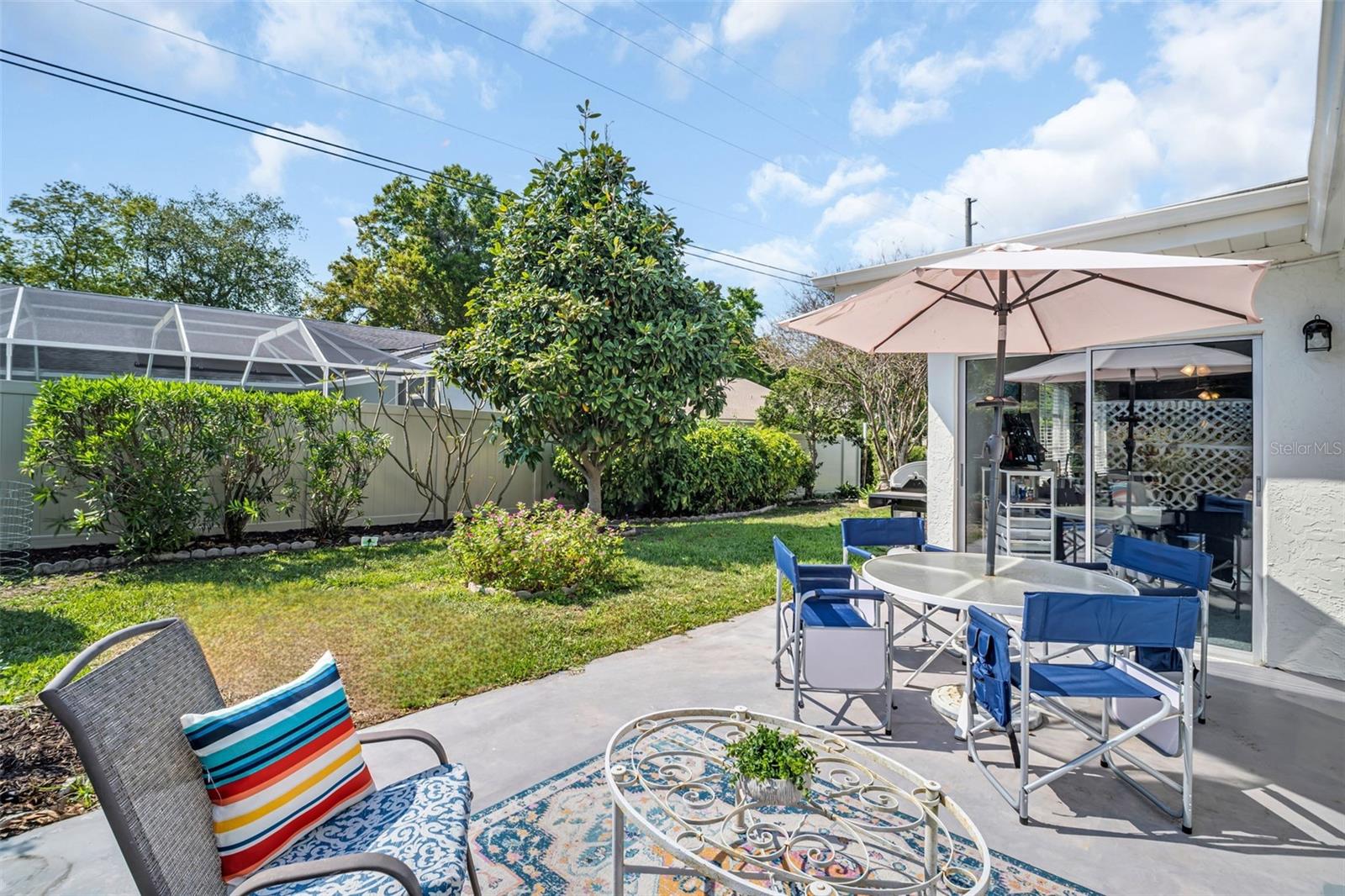 Private back patio for outdoor furniture & grill~