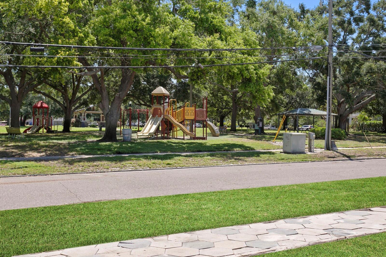 Virtually enhanced to illustrate the expected lawn appearance after the grass has had time to grow. Actual yard has been recently raked and seeded.