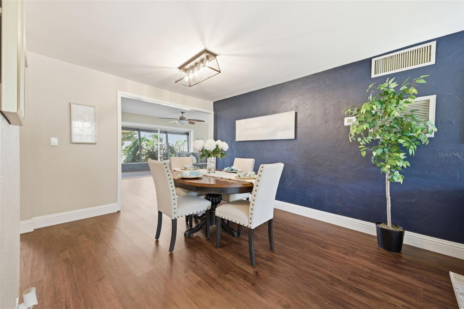 Dining room with view into family room
