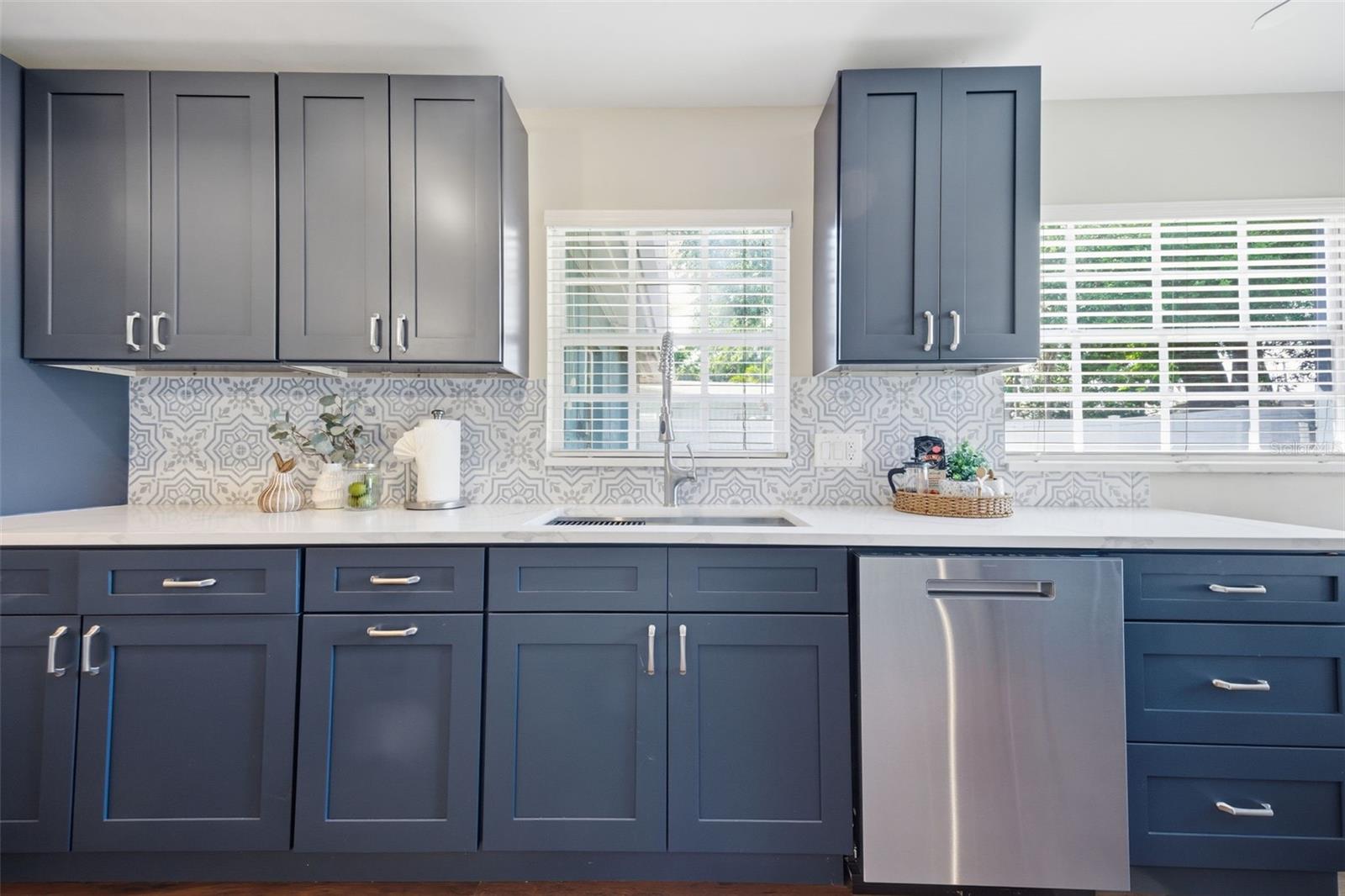 Kitchen with quartz countertops.