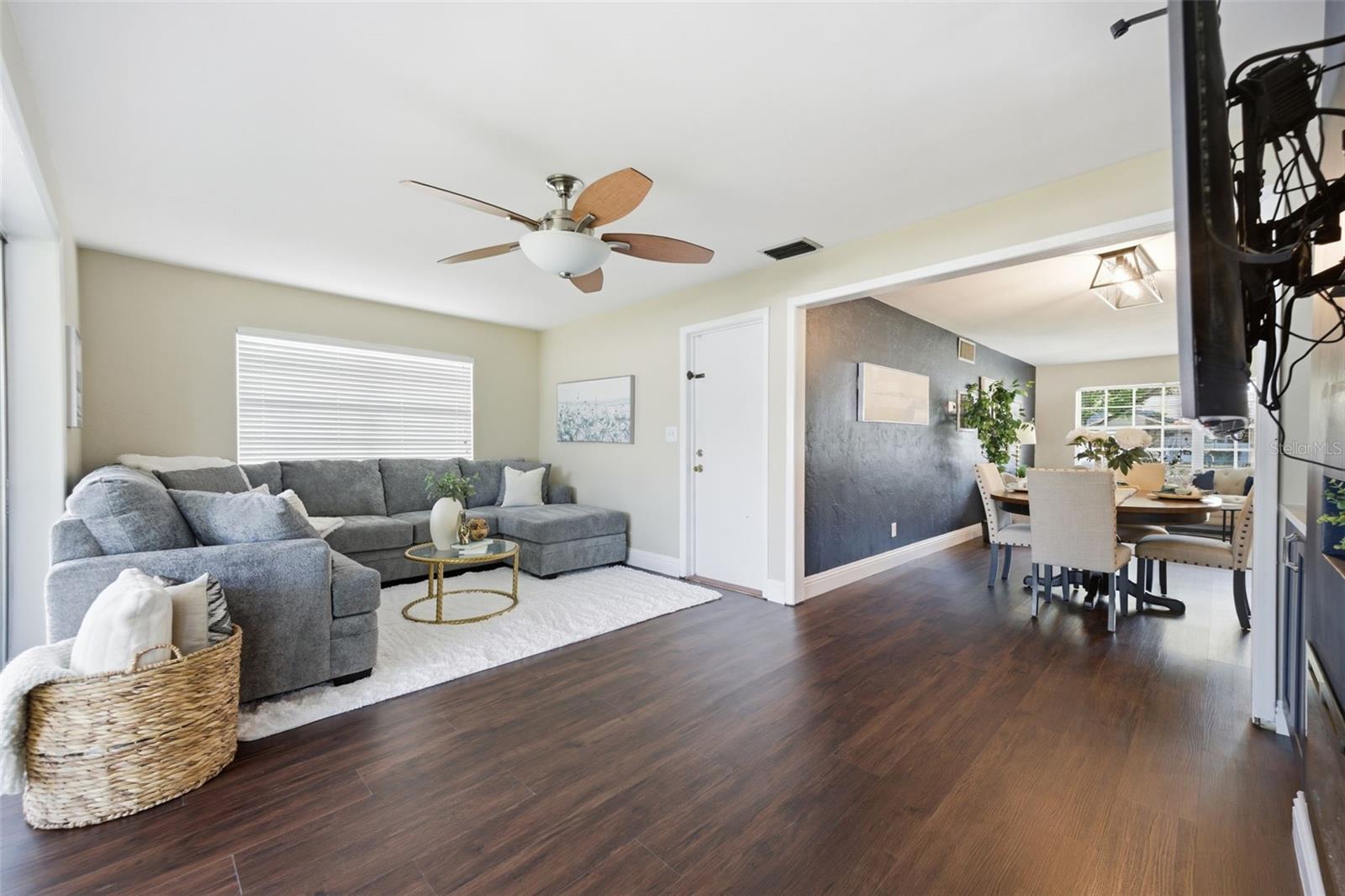 Family room with view into dining room/livingroom.