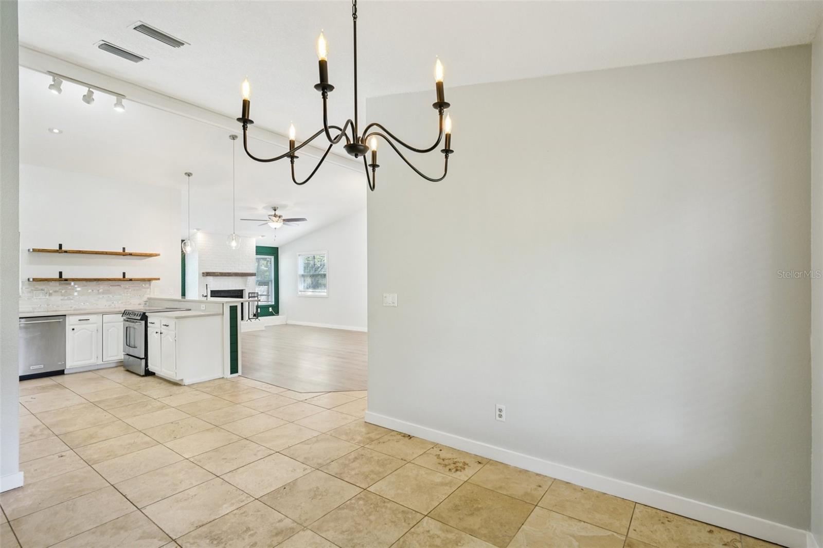 Dining room looking toward kitchen and family room
