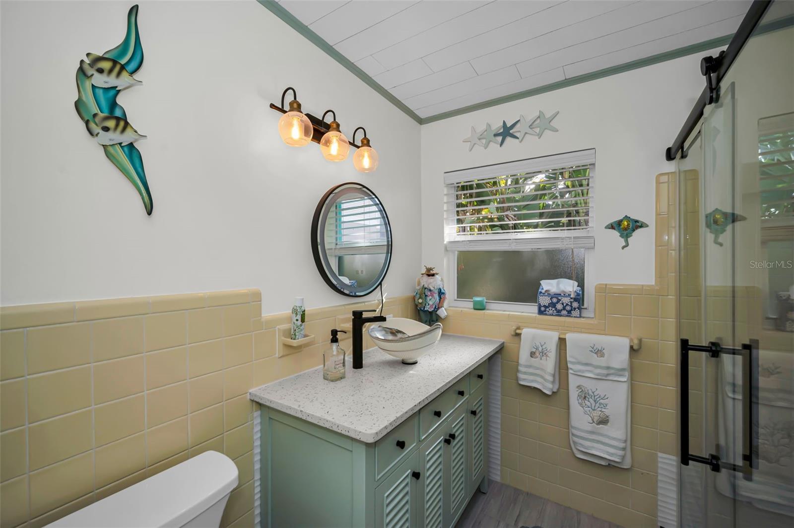 Vintage Bath with a Murano Glass Vessel Stunning