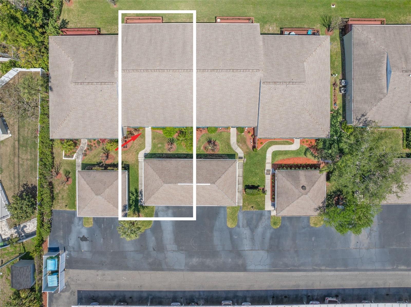 Aerial view highlighting the location of the villa and garage.