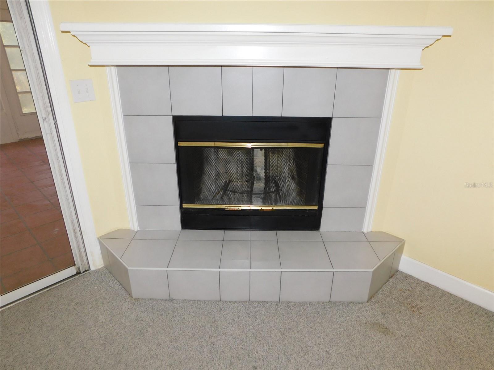 Wood burning fireplace in Family room