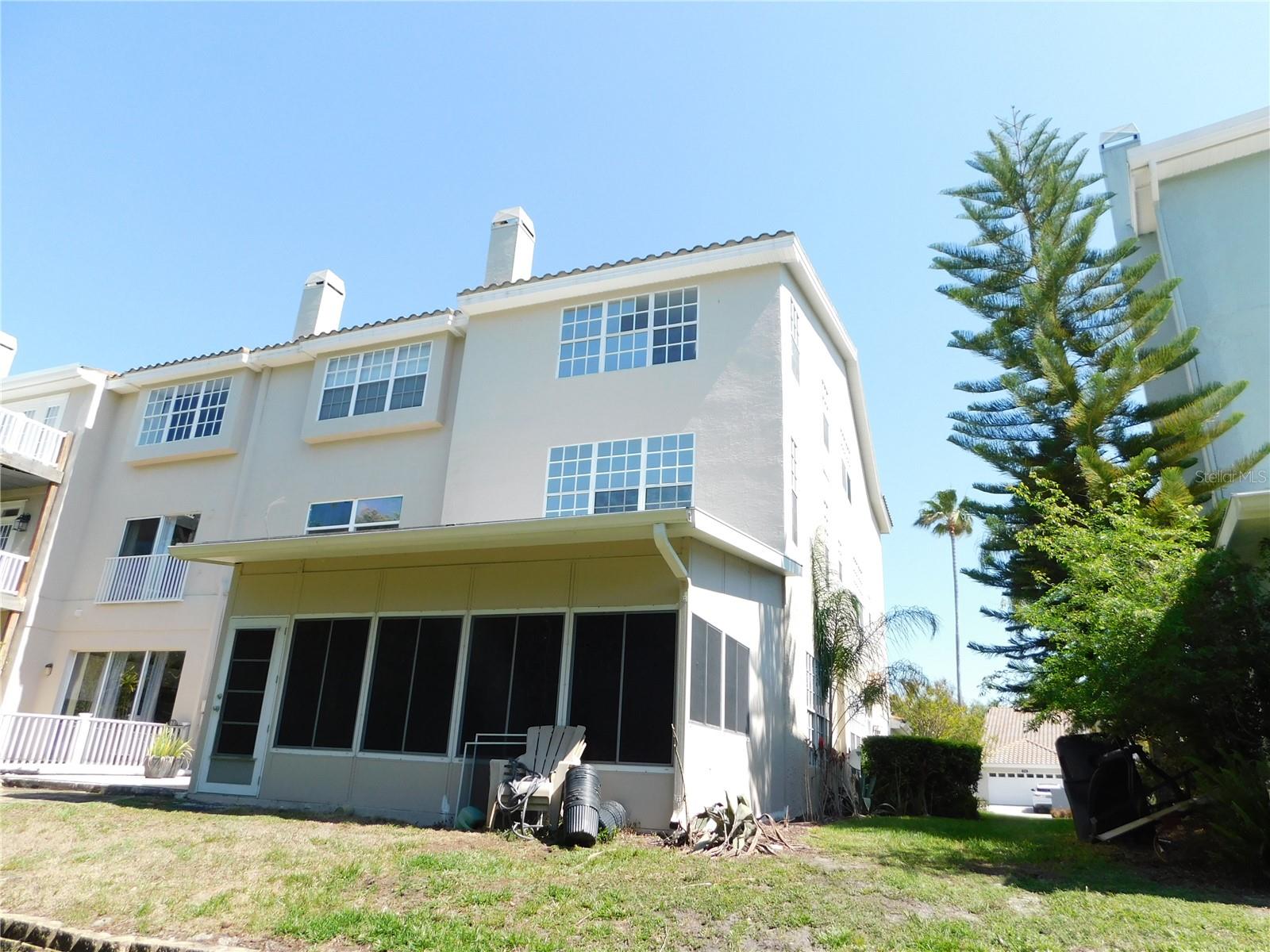 Back view of Florida Room and 3 stories of the home