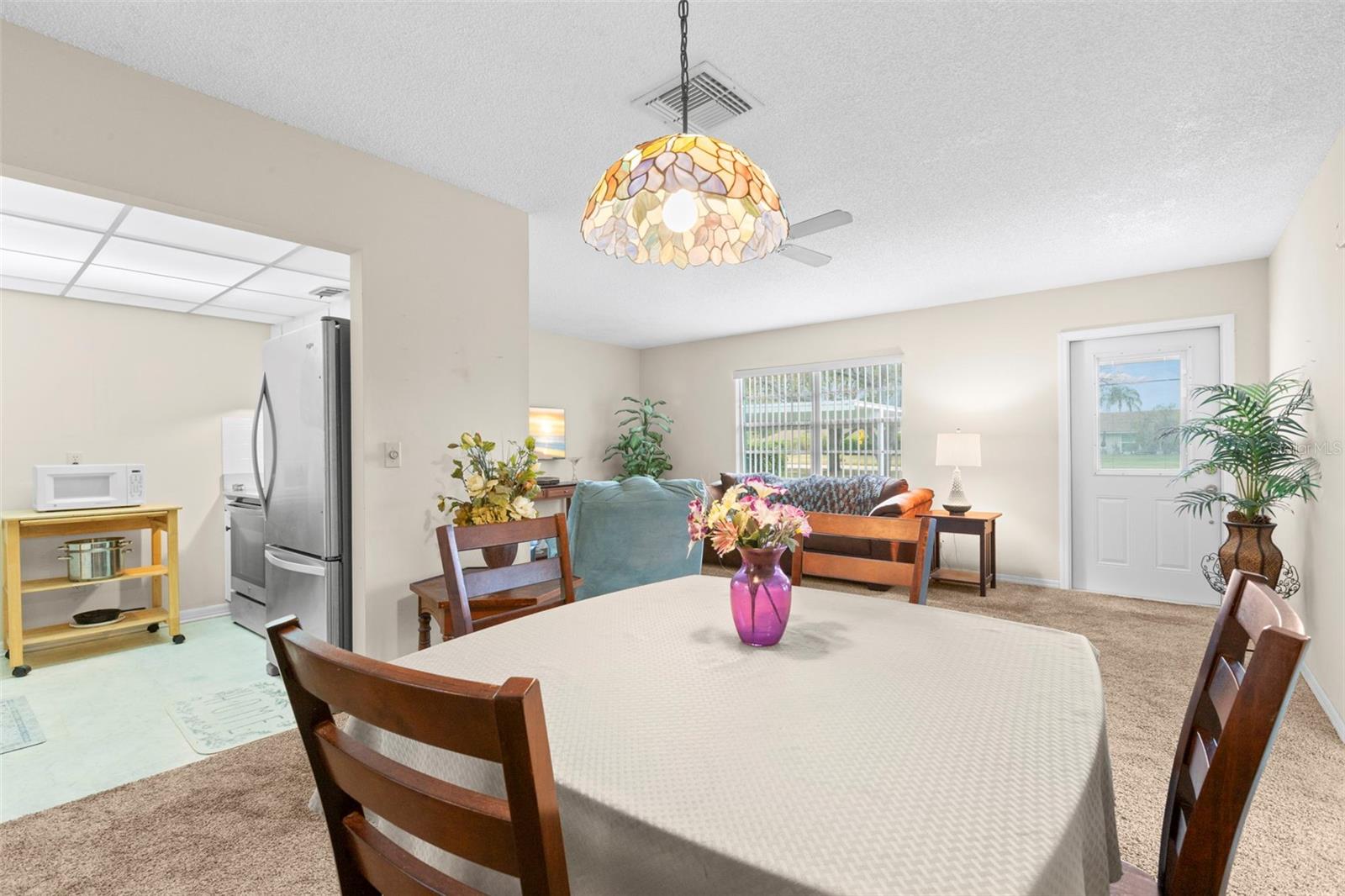 Dining with View of Kitchen and Living Room