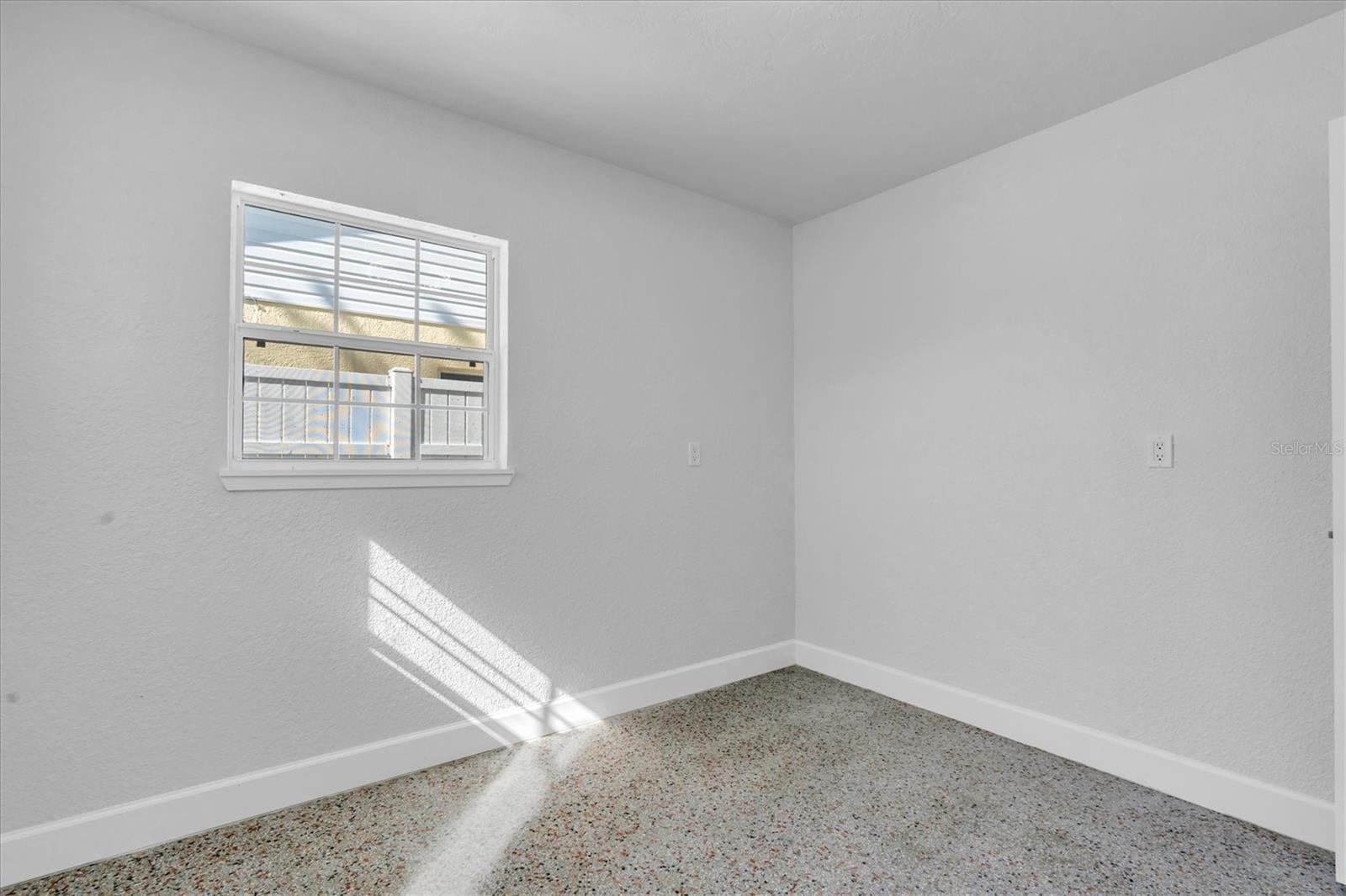 Bedroom 1 - Terrazo Flooring throughout - Right Side