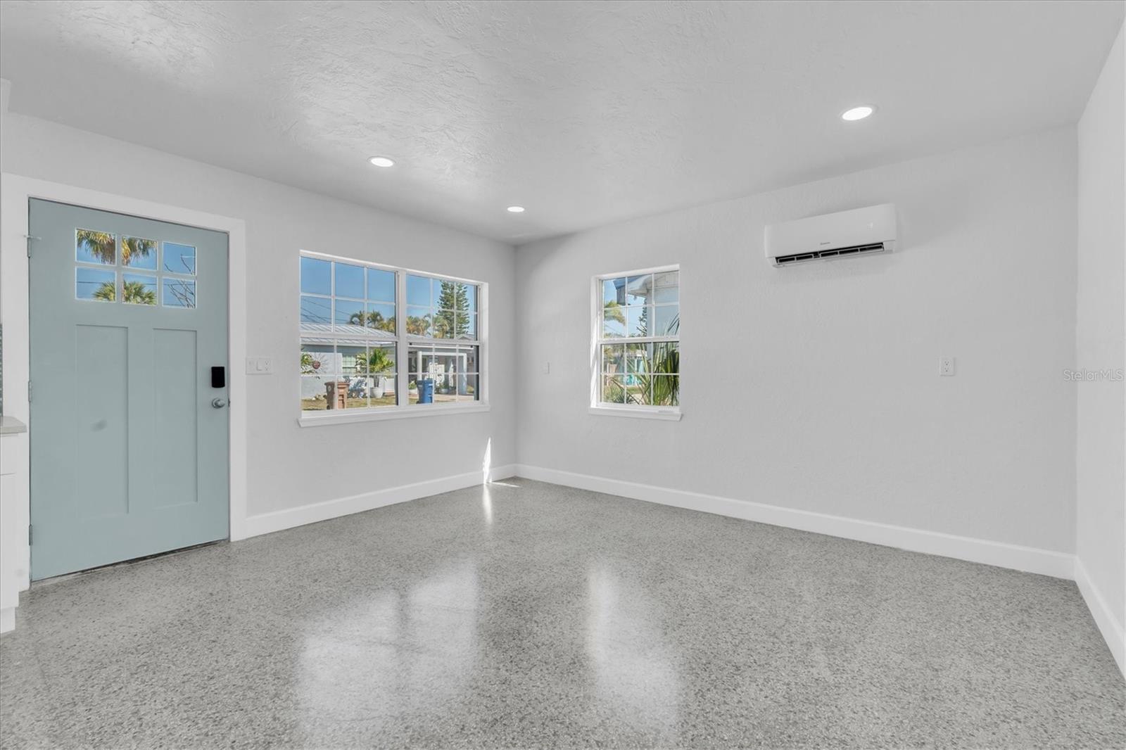 Living Area with Terrazzo Flooring throughout, mini split, recessed lighting- Left Side