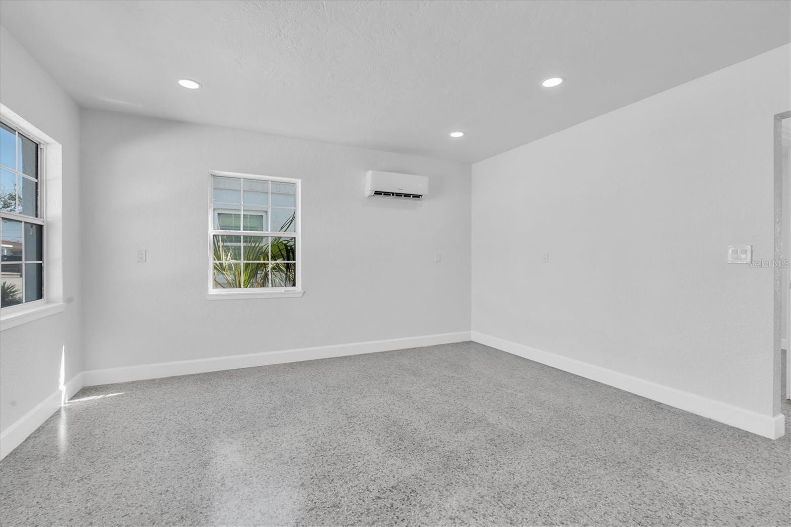 Living Area with Terrazzo Flooring throughout, mini split, recessed lighting- Left Side