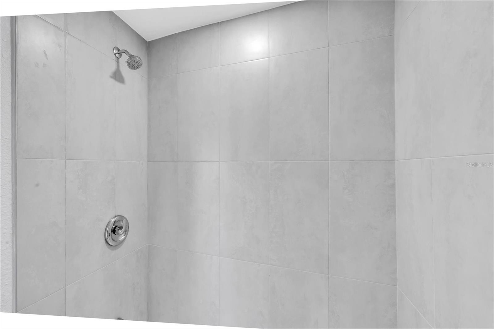 Newly Remodeled Tiled Shower Left Side
