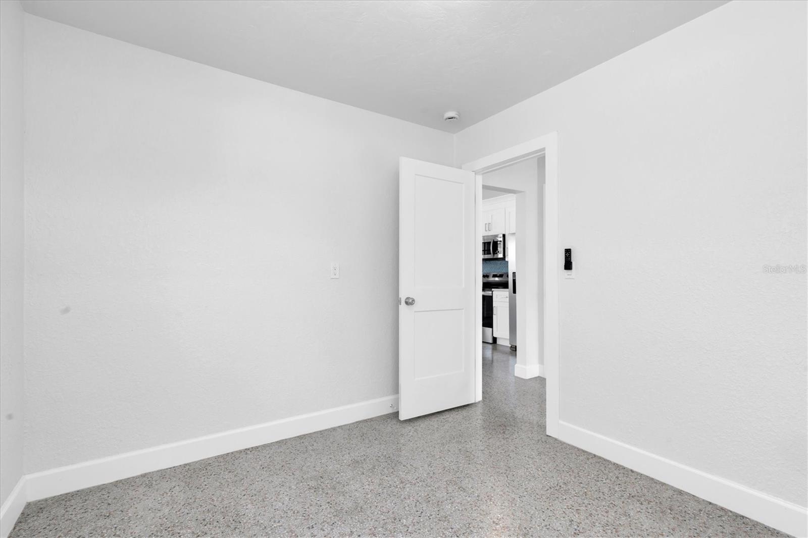 Bedroom 1 - Terrazo Flooring throughout - Right Side