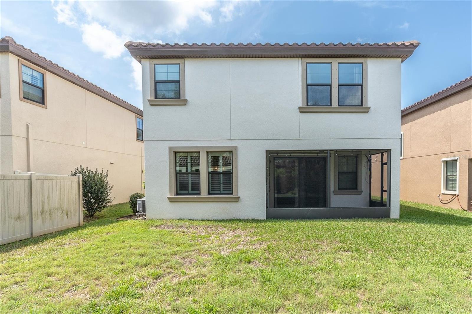 Screened lanai with pavers, Back of home