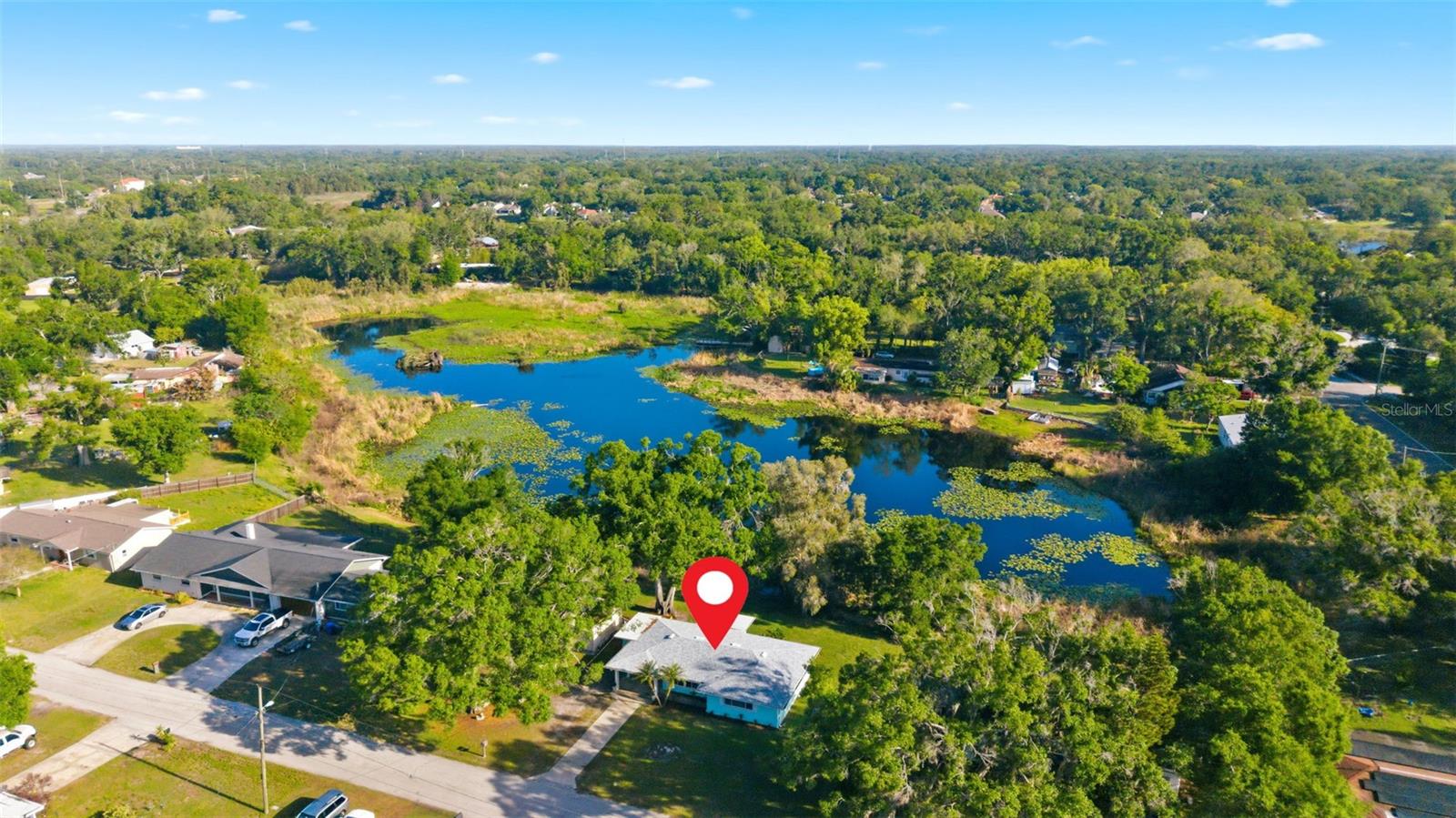 Almost a 1/2 acre lakefront lot on quiet dead end street.