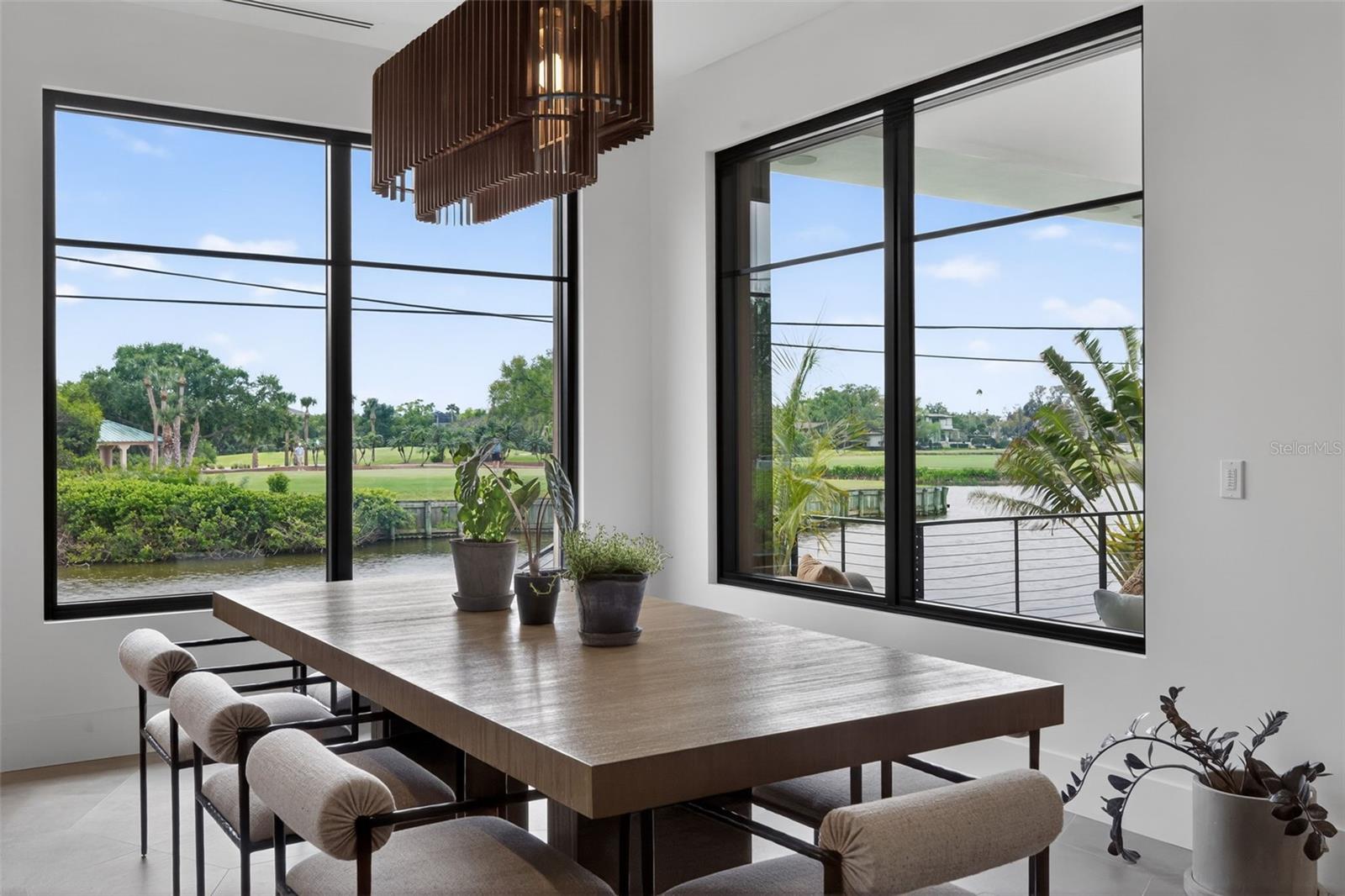 Dining overlooking the water and golf course