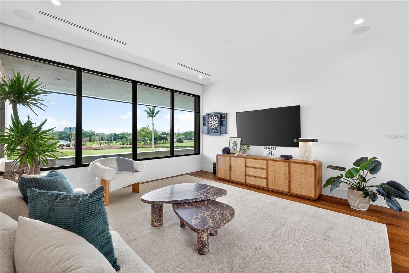 Second level living room with views of Downtown Skyline