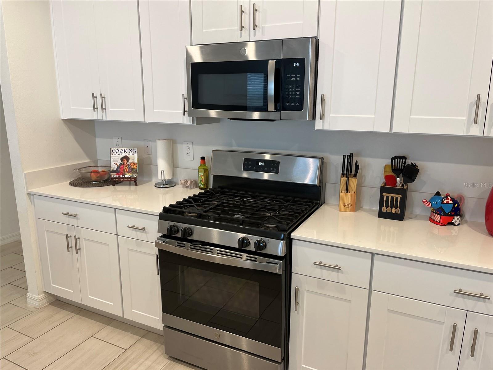 Kitchen w/stove and microwave