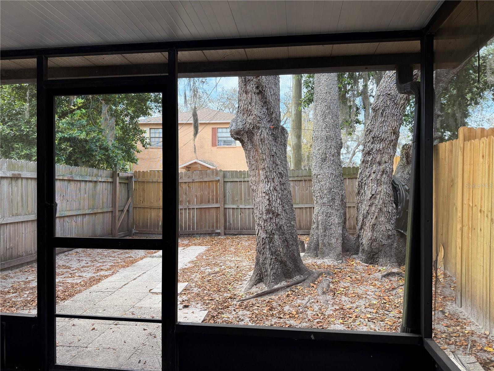 Covered Screened Patio and Private Fenced Backyard