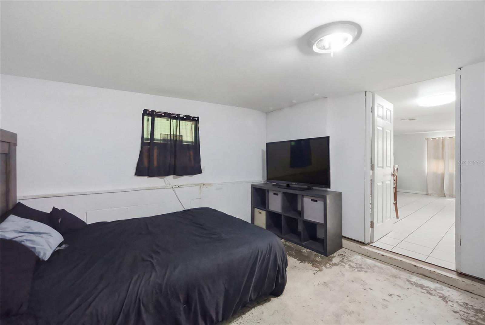 Back porch converted into a 4th bedroom