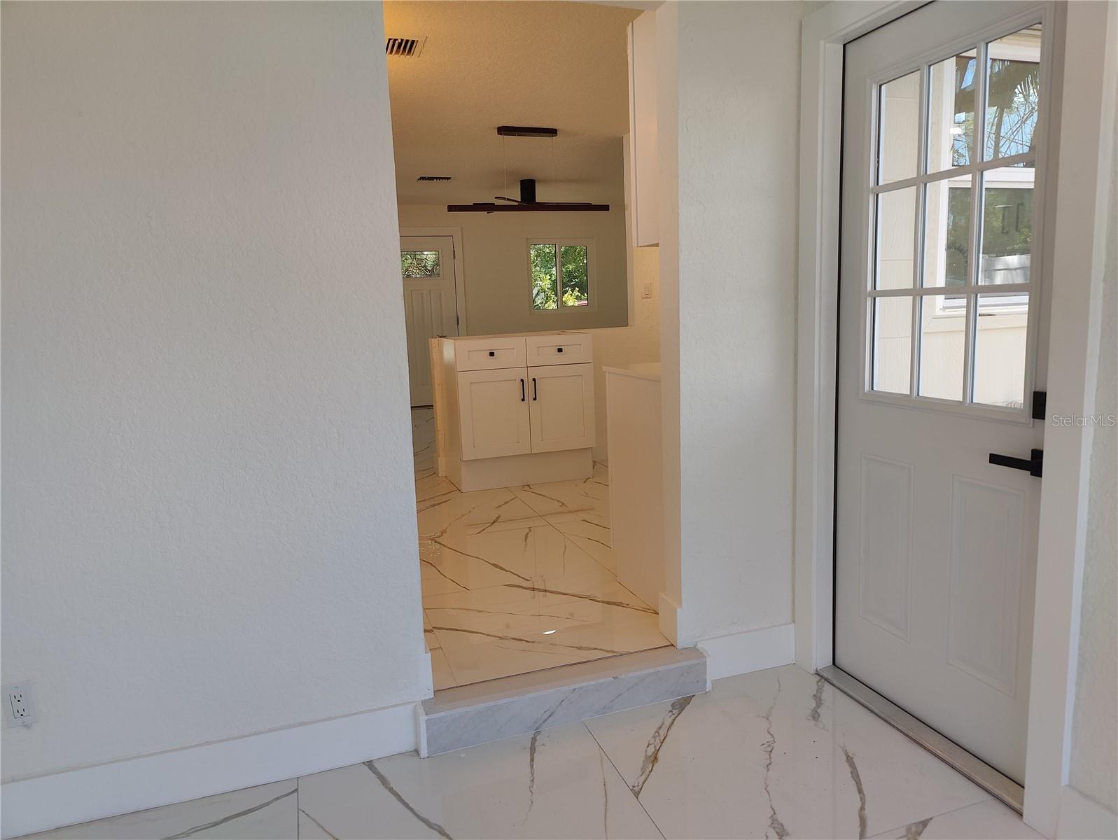 Office Room View Into Kitchen