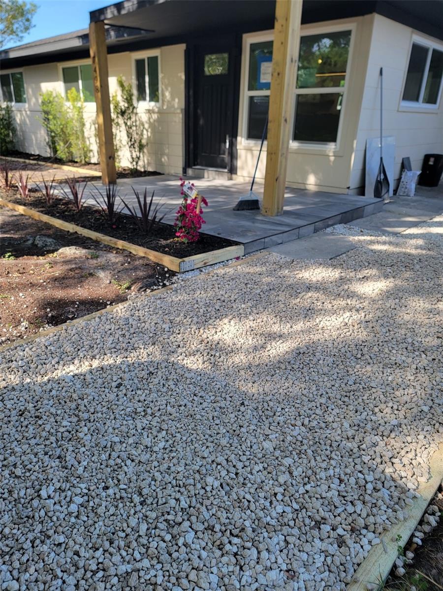 Gravel Fill View With Front Home View
