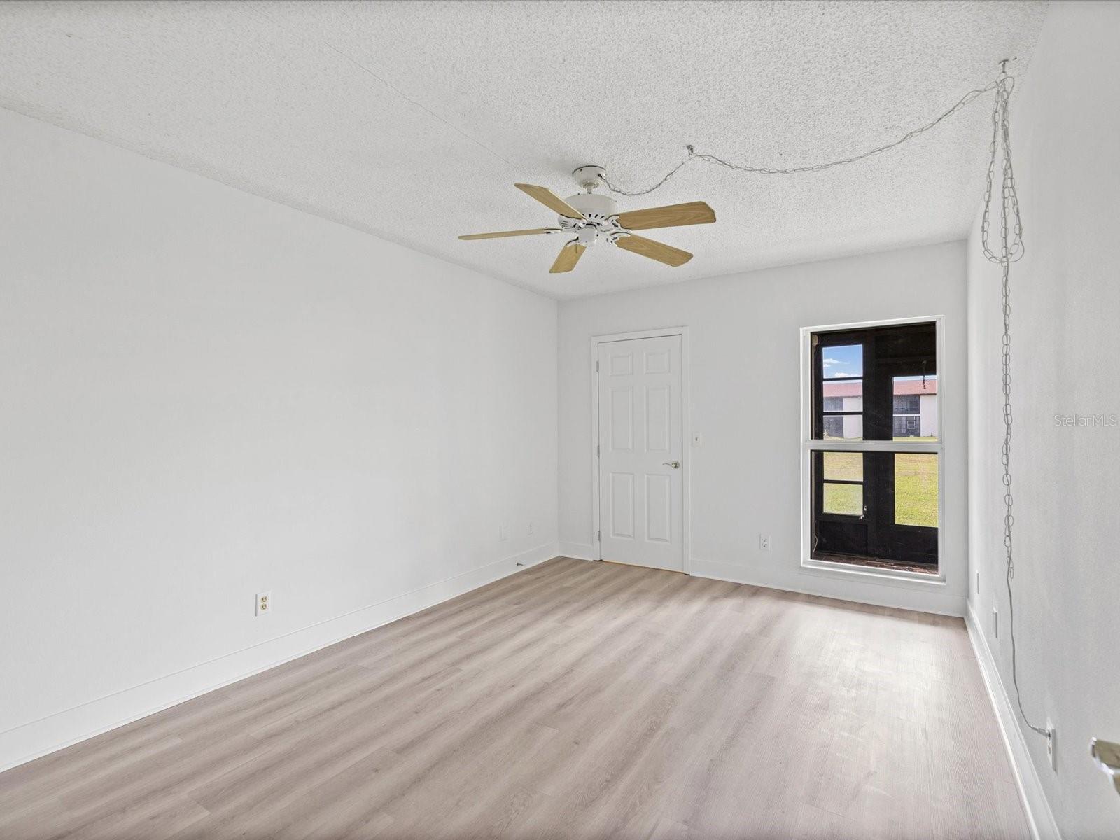 WALKING INTO LARGE BEDROOM