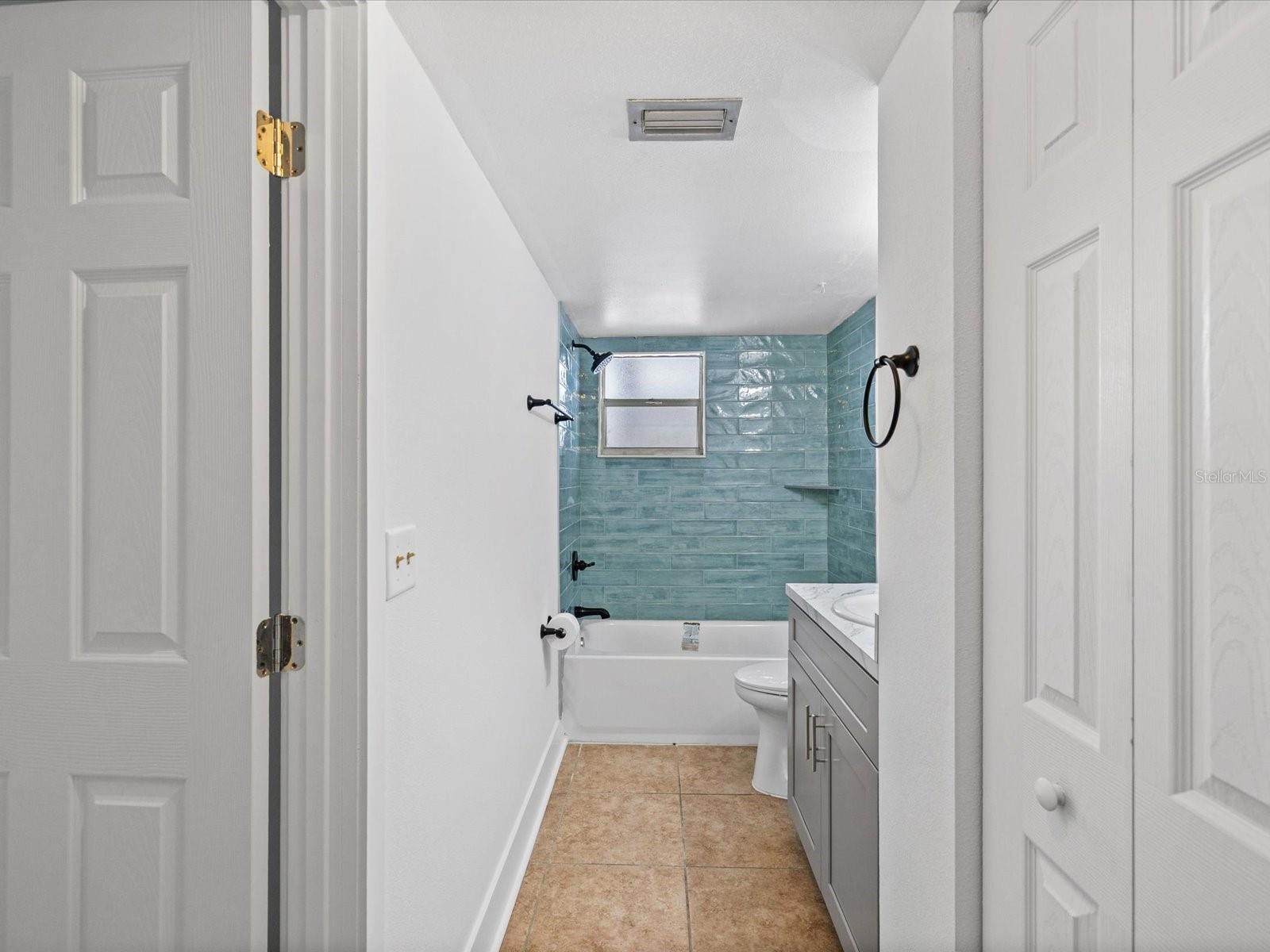 ENSUITE BATH AND LINEN CLOSET