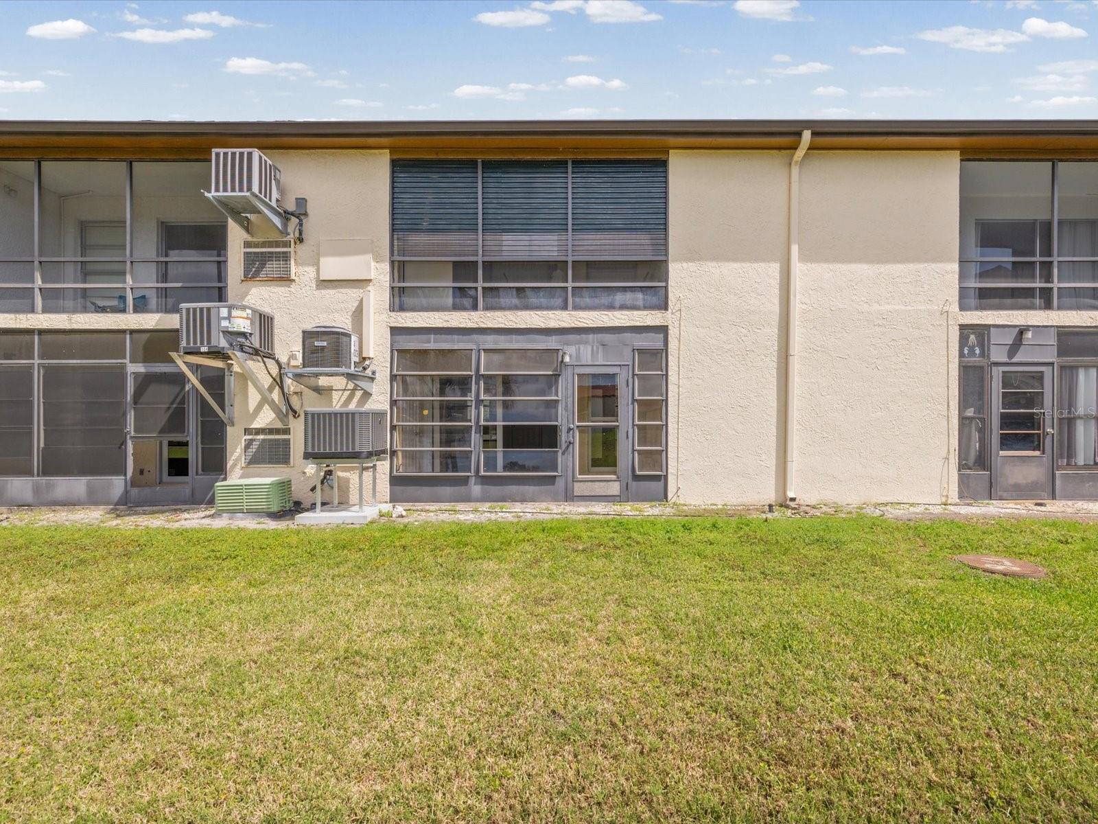 REAR OF CONDO - NEW A/C