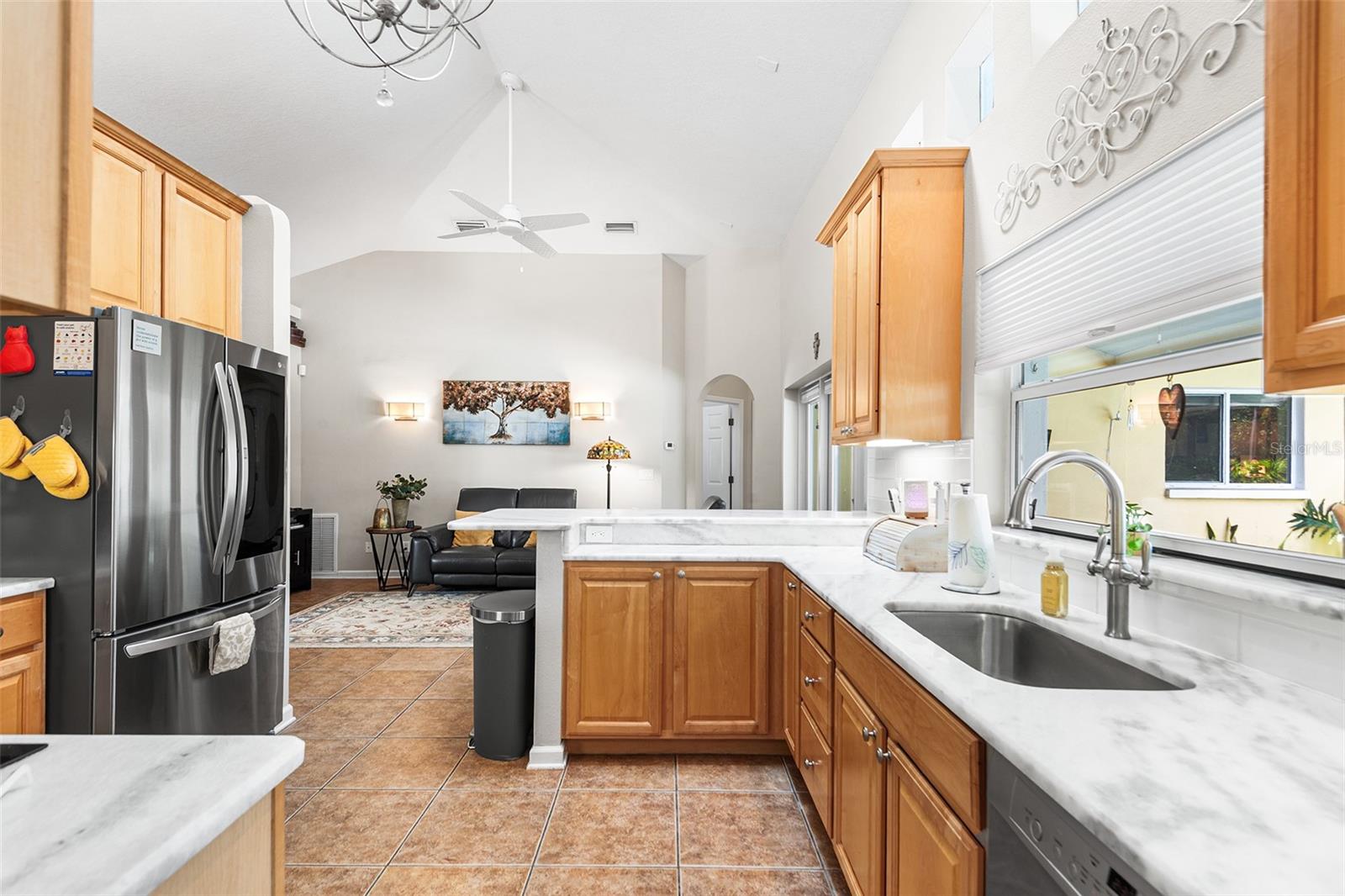 Kitchen with Granite Counters and KraftMaid wood cabinets.