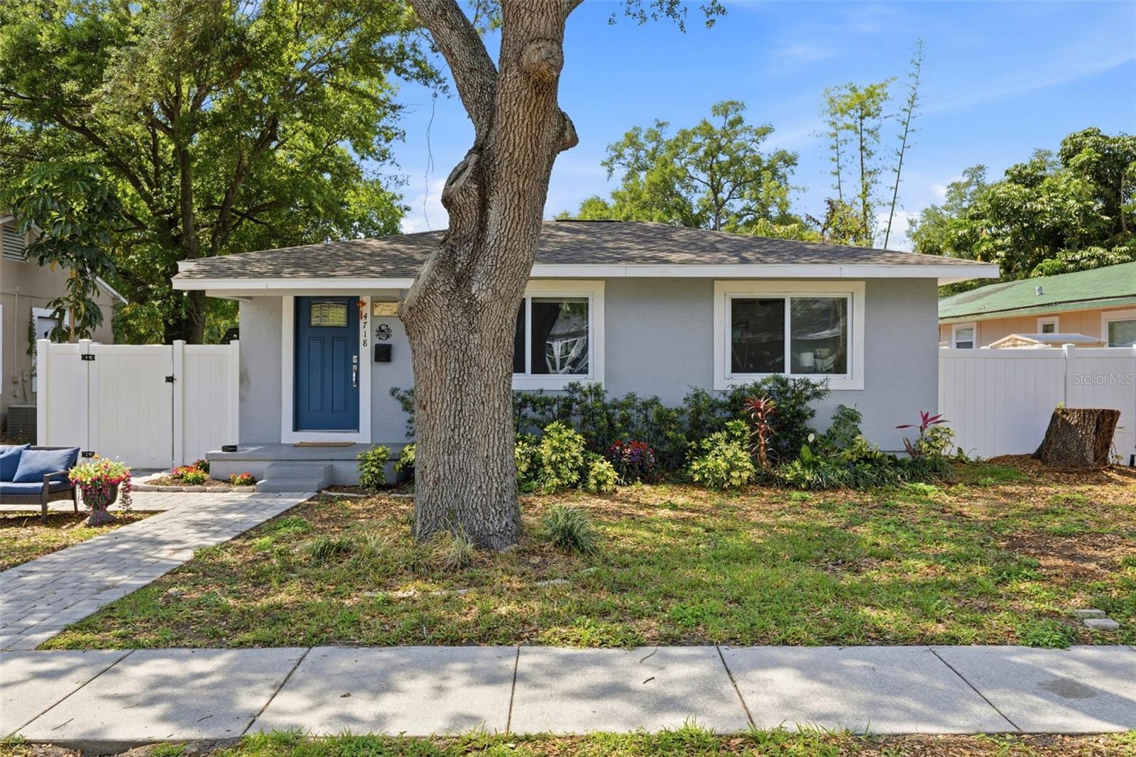 Welcome Home! Charming St. Pete mid-century bungalow with mature oak trees