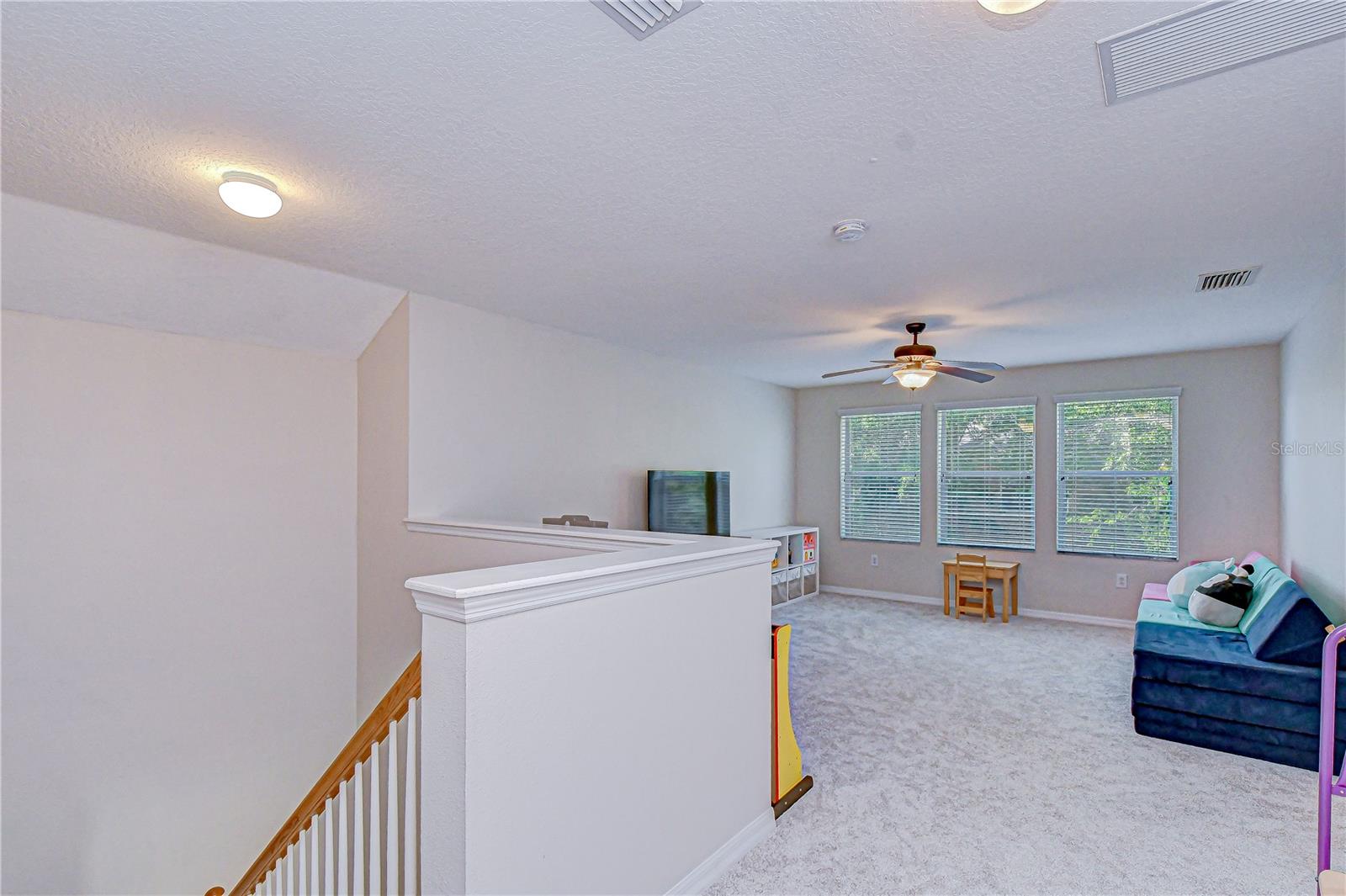 Large open loft offering flexible living space.