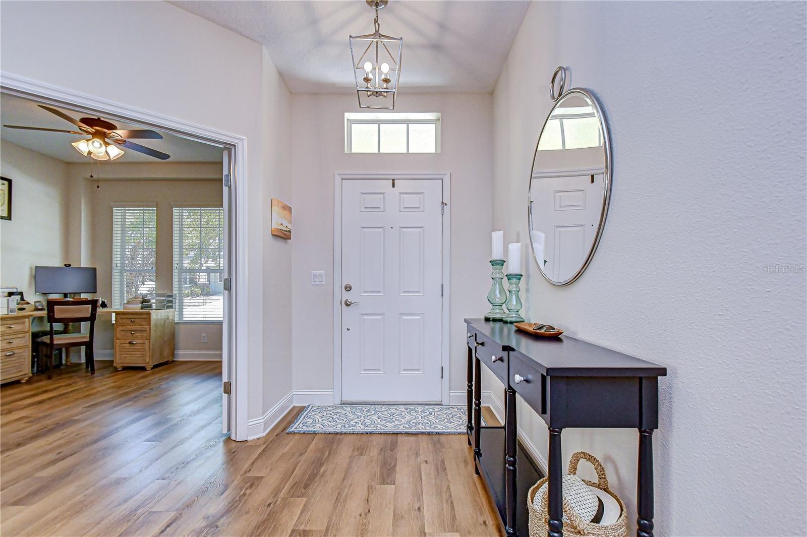 Welcoming entry with neutral finishes throughout.