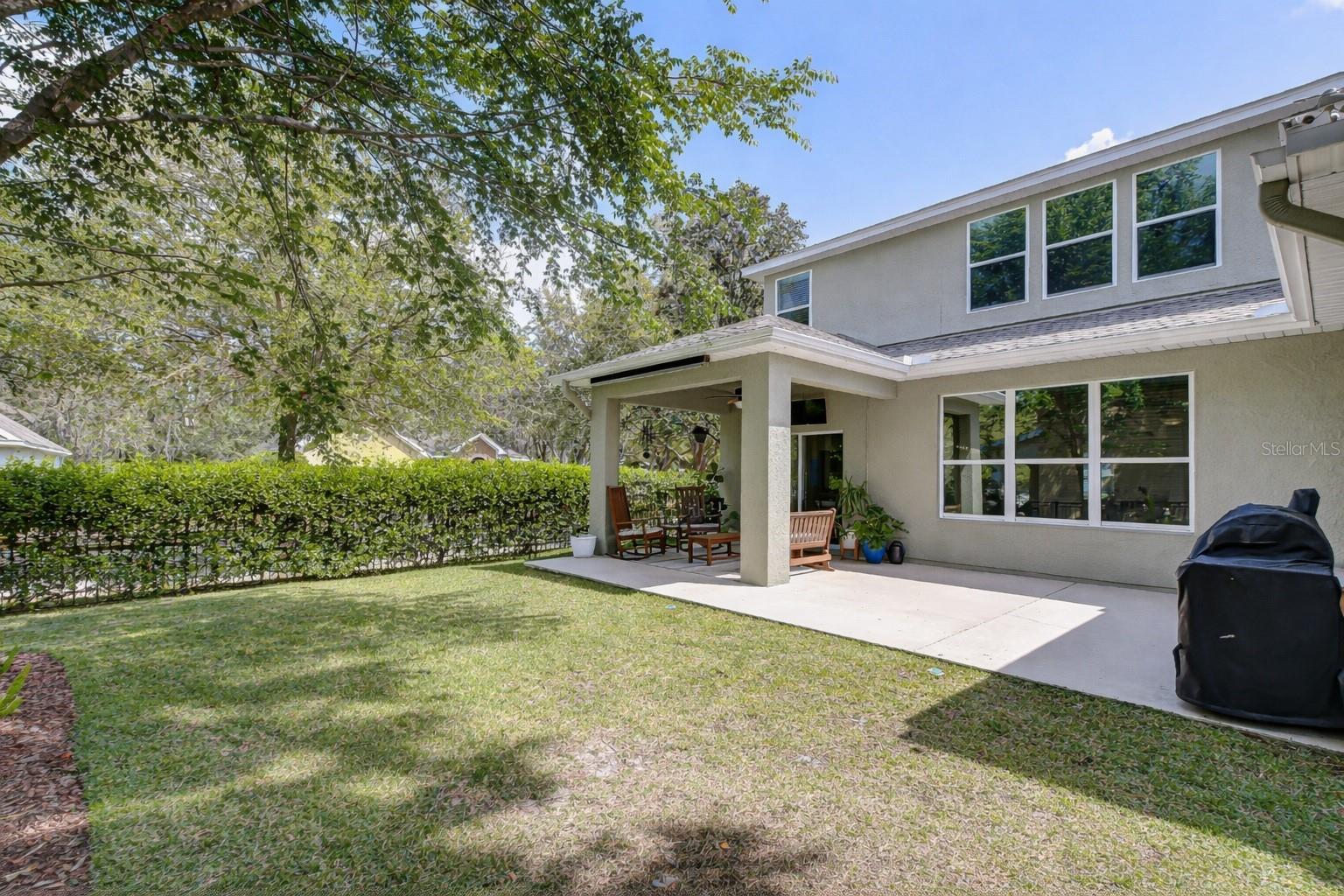 Expansive fenced backyard.
