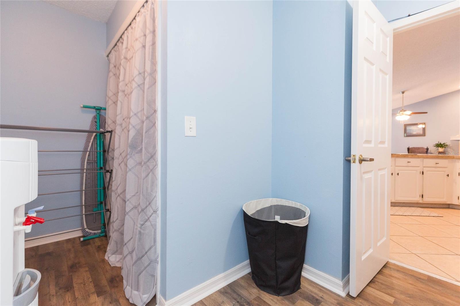 Storage space off the laundry room