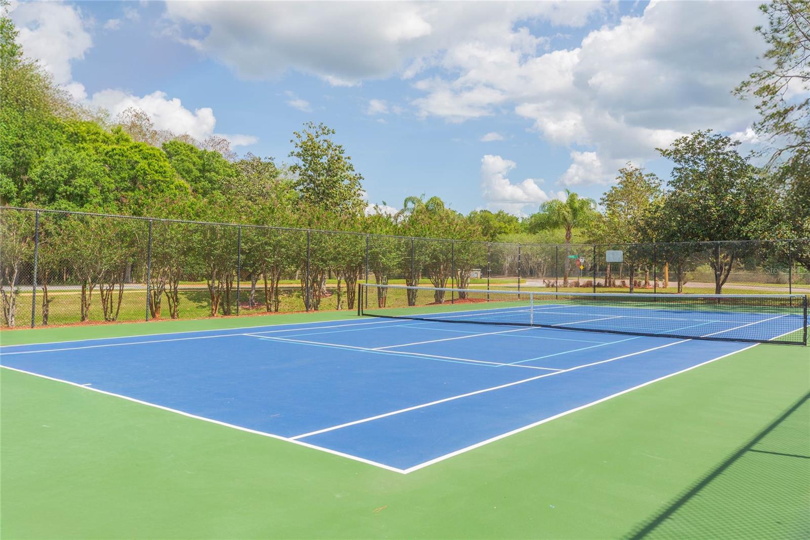 Tennis court across the street
