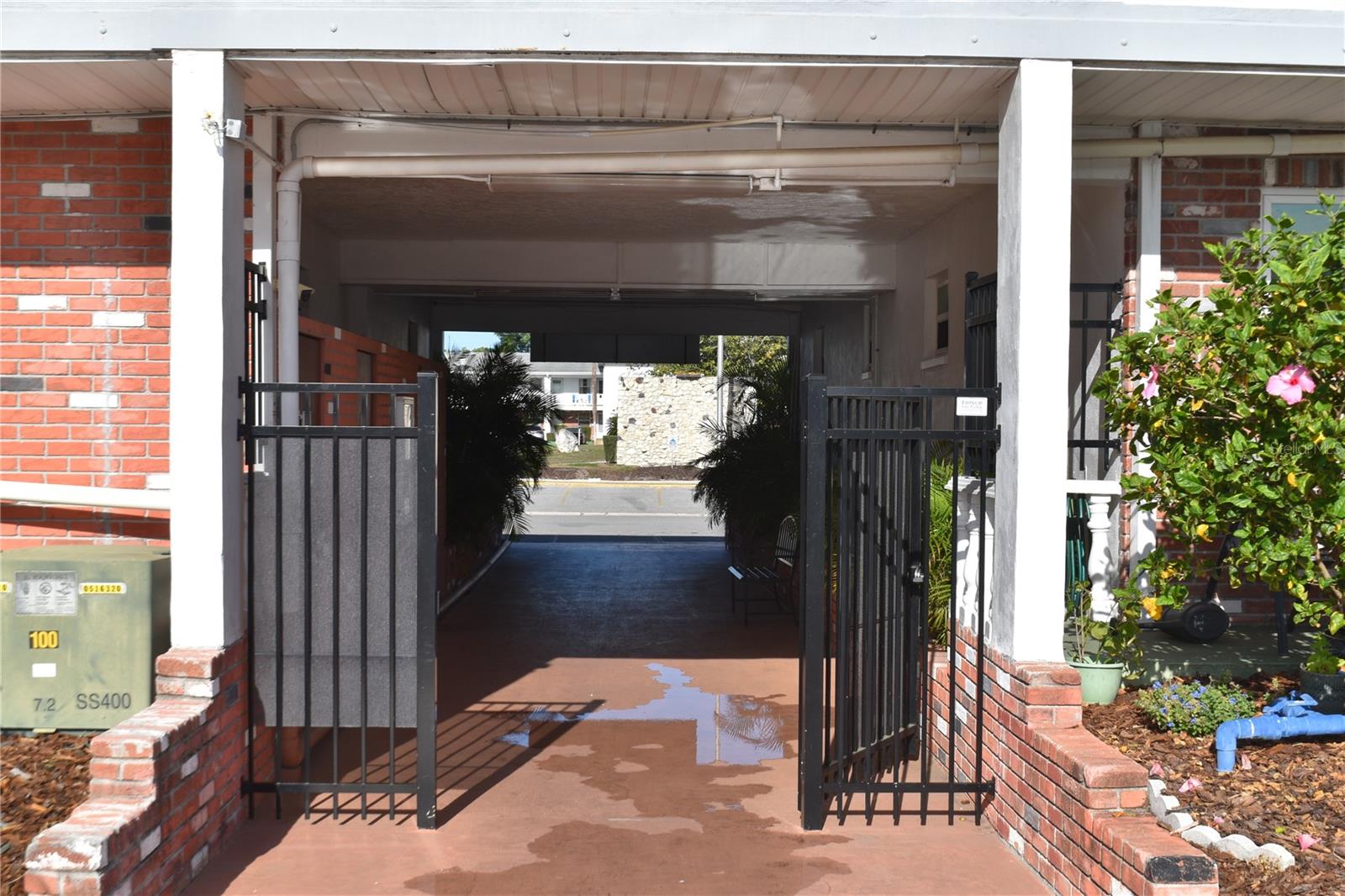 Entrance to building courtyard from inside courtyard facing the Azalea St at the front of building.